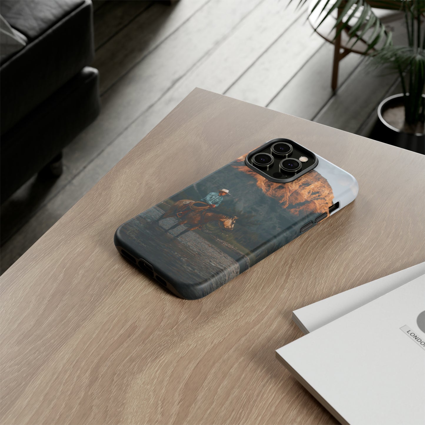 Capture the Wild: Horse Art Western Photo Yellowstone Design iPhone Tough Protective Cover. Featuring a Cowboy amidst Mountains and Buckskin hues, compatible with iPhone 15, 14, 13, XS, XR Pro/Max/Mini/P/Plus. Embrace the Spirit of the West with Style and Durability. #ElizaSinger #PhoneCase #WesternDesign