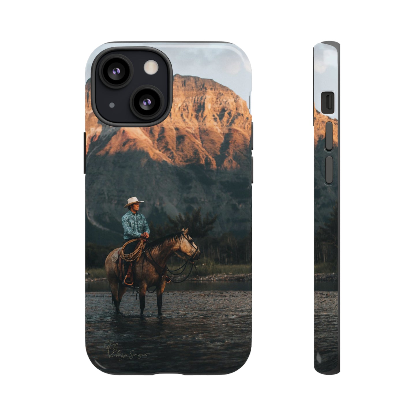 Capture the Wild: Horse Art Western Photo Yellowstone Design iPhone Tough Protective Cover. Featuring a Cowboy amidst Mountains and Buckskin hues, compatible with iPhone 15, 14, 13, XS, XR Pro/Max/Mini/P/Plus. Embrace the Spirit of the West with Style and Durability. #ElizaSinger #PhoneCase #WesternDesign