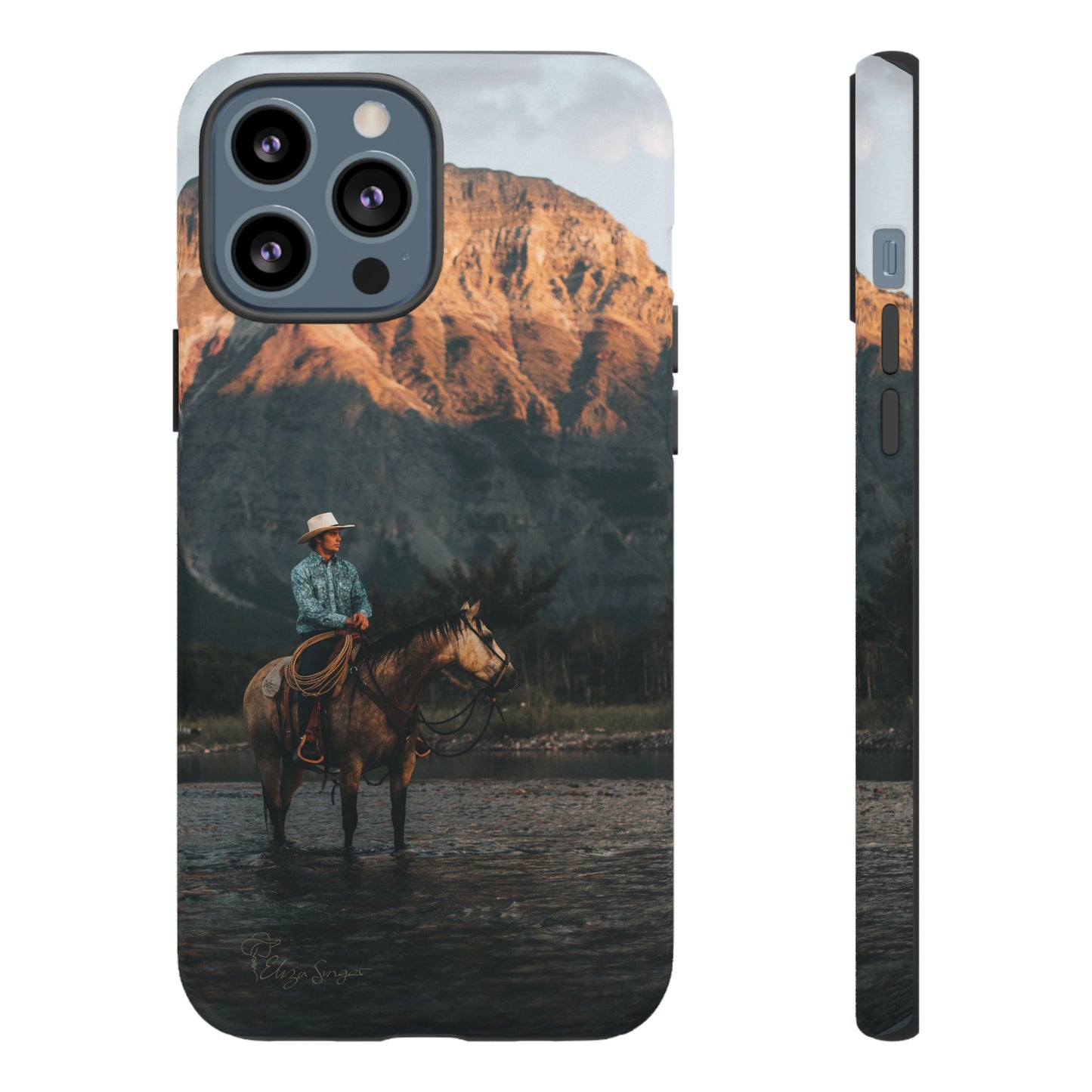 Capture the Wild: Horse Art Western Photo Yellowstone Design iPhone Tough Protective Cover. Featuring a Cowboy amidst Mountains and Buckskin hues, compatible with iPhone 15, 14, 13, XS, XR Pro/Max/Mini/P/Plus. Embrace the Spirit of the West with Style and Durability. #ElizaSinger #PhoneCase #WesternDesign
