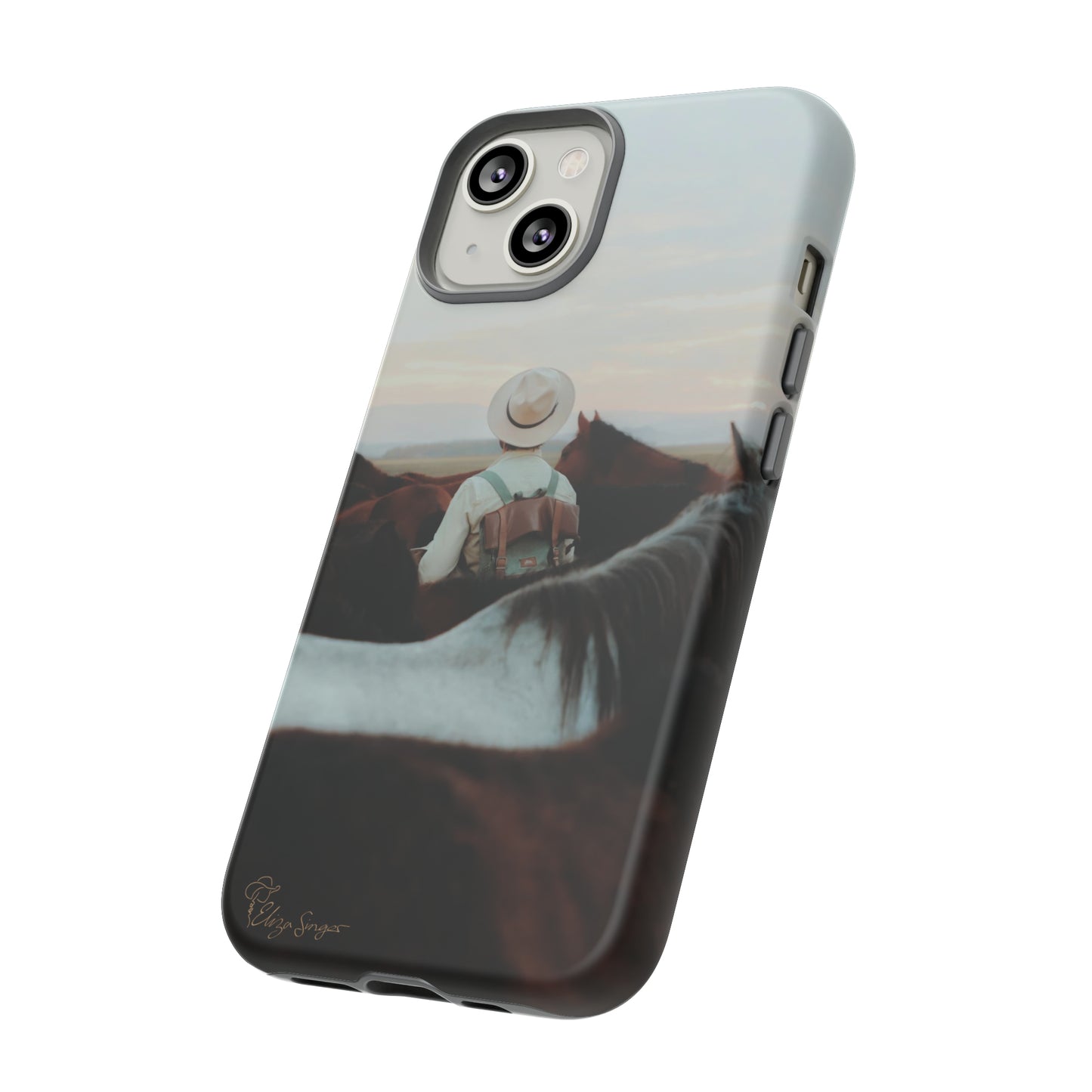 Ride into the Wild: Horse Art Western Photo Yellowstone Design iPhone Tough Protective Cover. Featuring a Cowboy amidst Mountains and Buckskin hues. Compatible with iPhone 15, 14, 13, XS, XR Pro/Max/Mini/P/Plus. Embrace the Spirit of the West with Style and Durability. #ElizaSinger #PhoneCase #WesternDesign