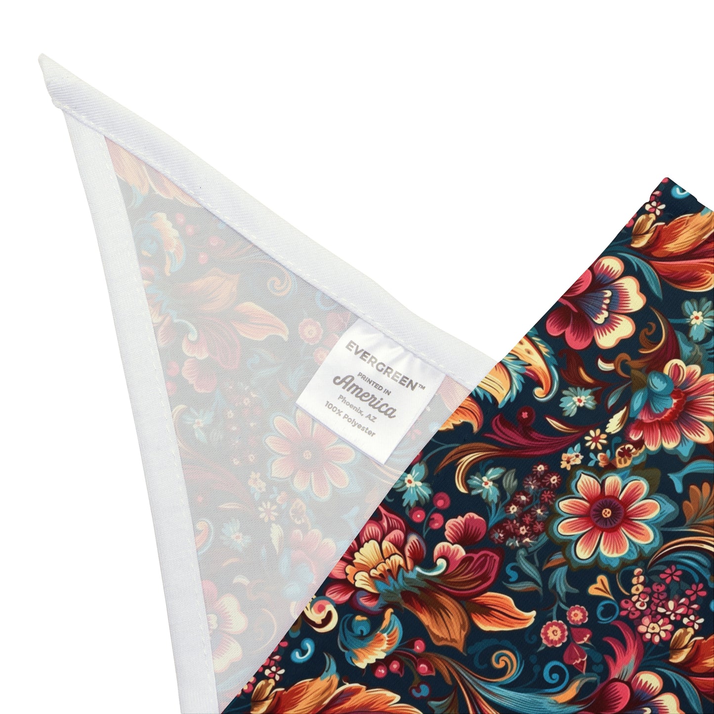 Immerse your dog in a Floral Symphony with our Dog Bandana/Wild Rag. The dark navy background adorned with flowers and paisley details in pink, turquoise, beige, orange, and more creates a harmonious and stylish ensemble. Crafted from soft-spun polyester, this wild rag ensures comfort and style. Also available for humans, exclusively at Eliza Singer.