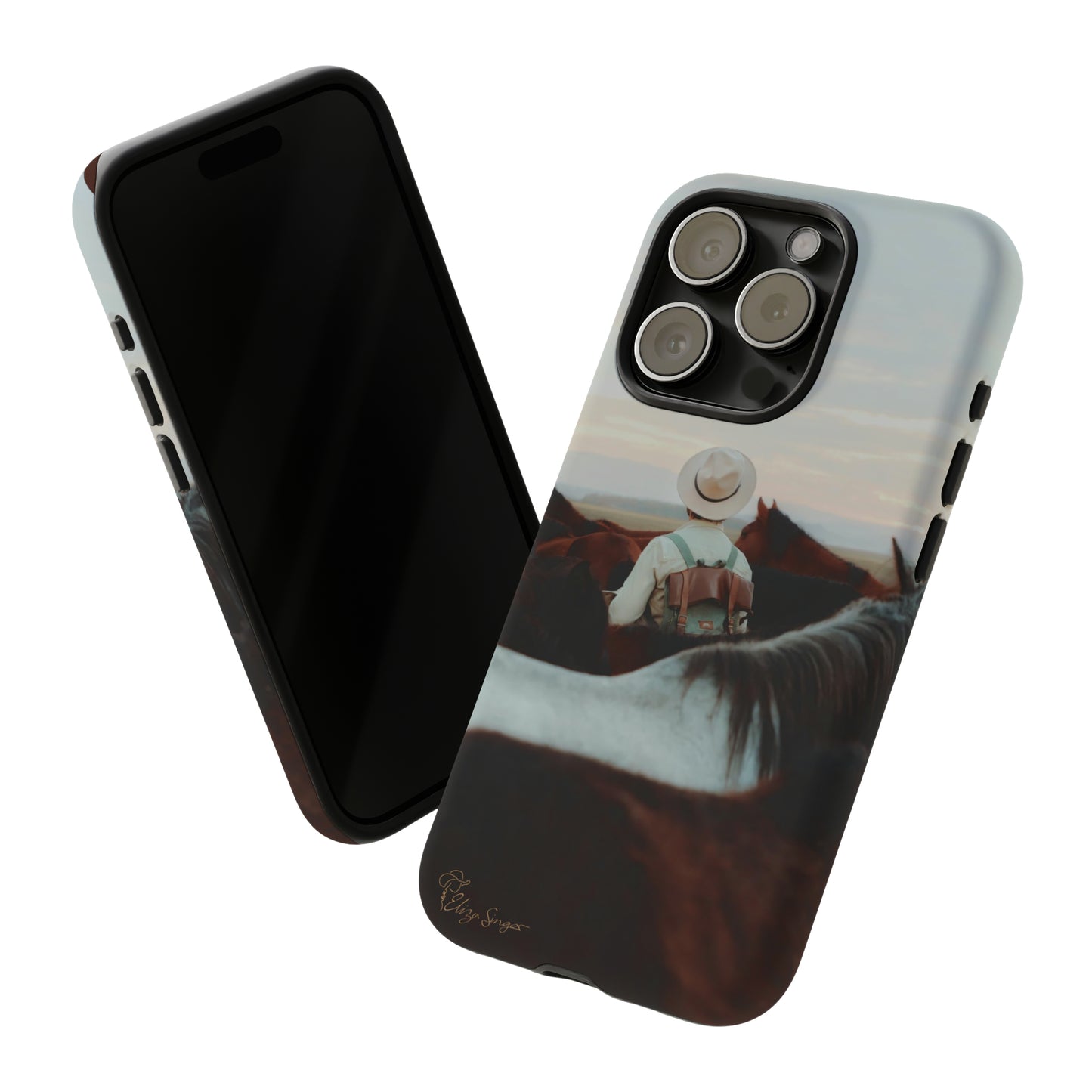 Ride into the Wild: Horse Art Western Photo Yellowstone Design iPhone Tough Protective Cover. Featuring a Cowboy amidst Mountains and Buckskin hues. Compatible with iPhone 15, 14, 13, XS, XR Pro/Max/Mini/P/Plus. Embrace the Spirit of the West with Style and Durability. #ElizaSinger #PhoneCase #WesternDesign