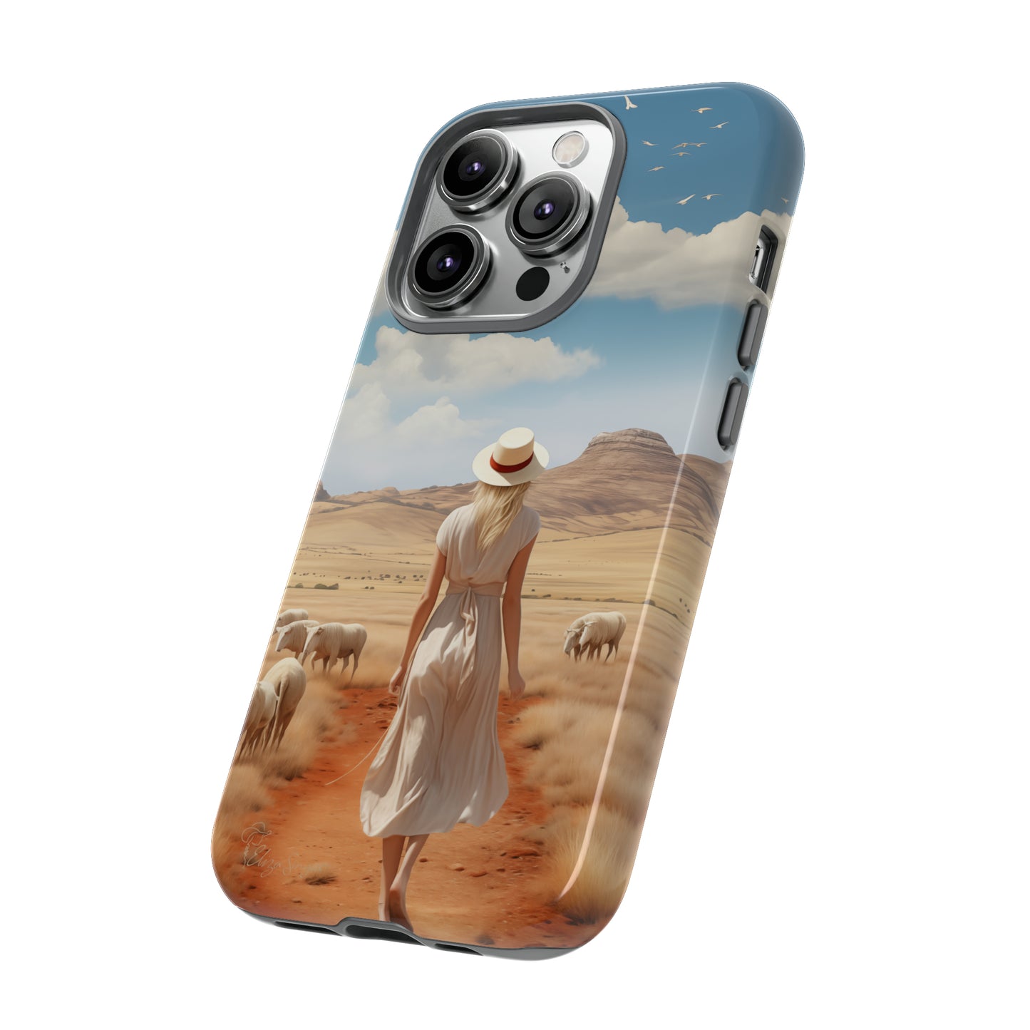 Serenity in Hand: Our Tough Western Cell Phone Case invites you to experience tranquility. A vintage painted design portrays a woman in a skirt and hat walking on a dirt road through a prairie, with grazing sheep. Let the vanishing horizon captivate your senses. Elevate your phone with timeless beauty. #ElizaSinger #PhoneCase