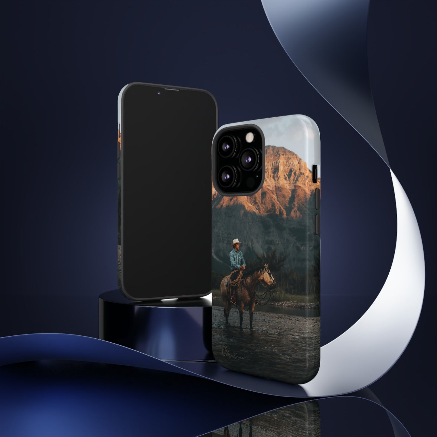 Capture the Wild: Horse Art Western Photo Yellowstone Design iPhone Tough Protective Cover. Featuring a Cowboy amidst Mountains and Buckskin hues, compatible with iPhone 15, 14, 13, XS, XR Pro/Max/Mini/P/Plus. Embrace the Spirit of the West with Style and Durability. #ElizaSinger #PhoneCase #WesternDesign