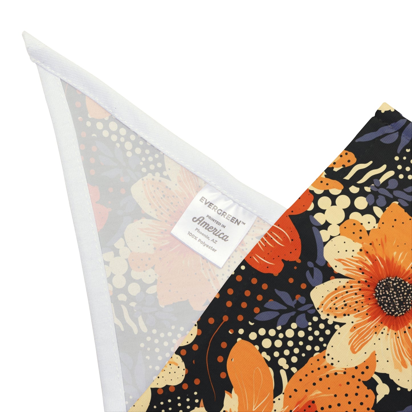 Add a touch of vibrancy to your dog's ensemble with our Abstract Sunset Dog Bandana/Wild Rag. The abstract shades of orange flowers on a black background, with small texture details like polka dots, create a lively and artistic look. Crafted from soft-spun polyester, this wild rag ensures comfort and style. Make a bold statement on every adventure with this exclusive design, available only at Eliza Singer.