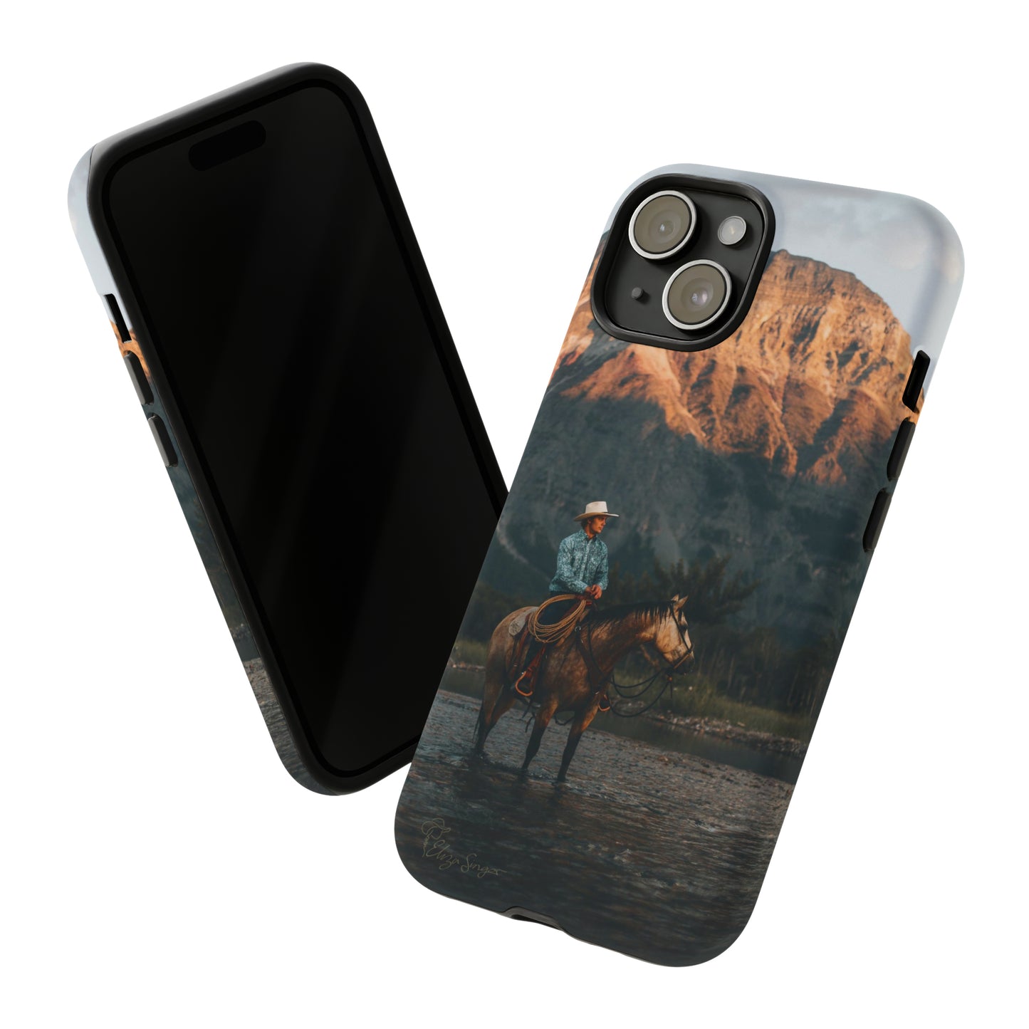Capture the Wild: Horse Art Western Photo Yellowstone Design iPhone Tough Protective Cover. Featuring a Cowboy amidst Mountains and Buckskin hues, compatible with iPhone 15, 14, 13, XS, XR Pro/Max/Mini/P/Plus. Embrace the Spirit of the West with Style and Durability. #ElizaSinger #PhoneCase #WesternDesign