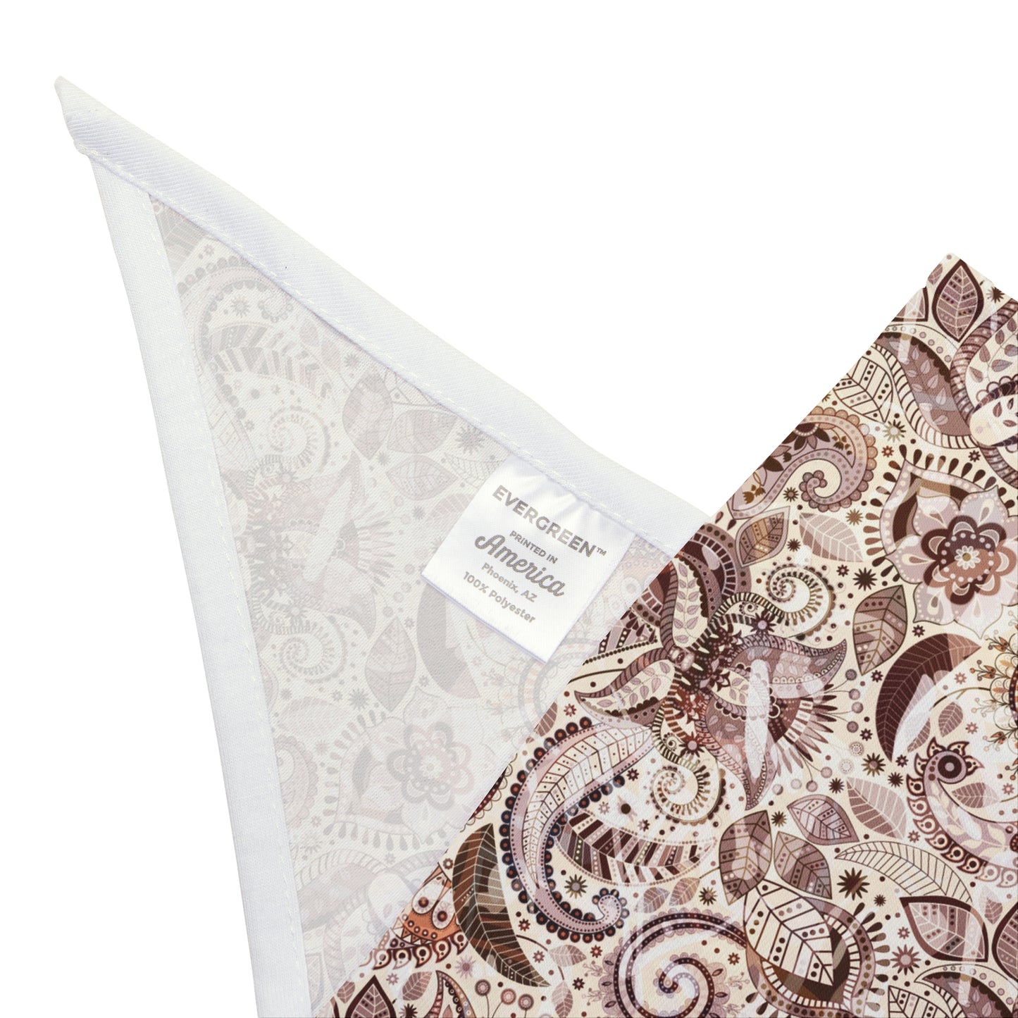 Bring a touch of warmth to your dog's look with our Sandstone Paisley Dog Bandana/Wild Rag. The light paisley design on a sand background, featuring darker shades of brown, adds a subtle and elegant touch. Crafted from soft-spun polyester, this wild rag ensures comfort and style. Make every outing a stylish affair with this exclusive design, available only at Eliza Singer.