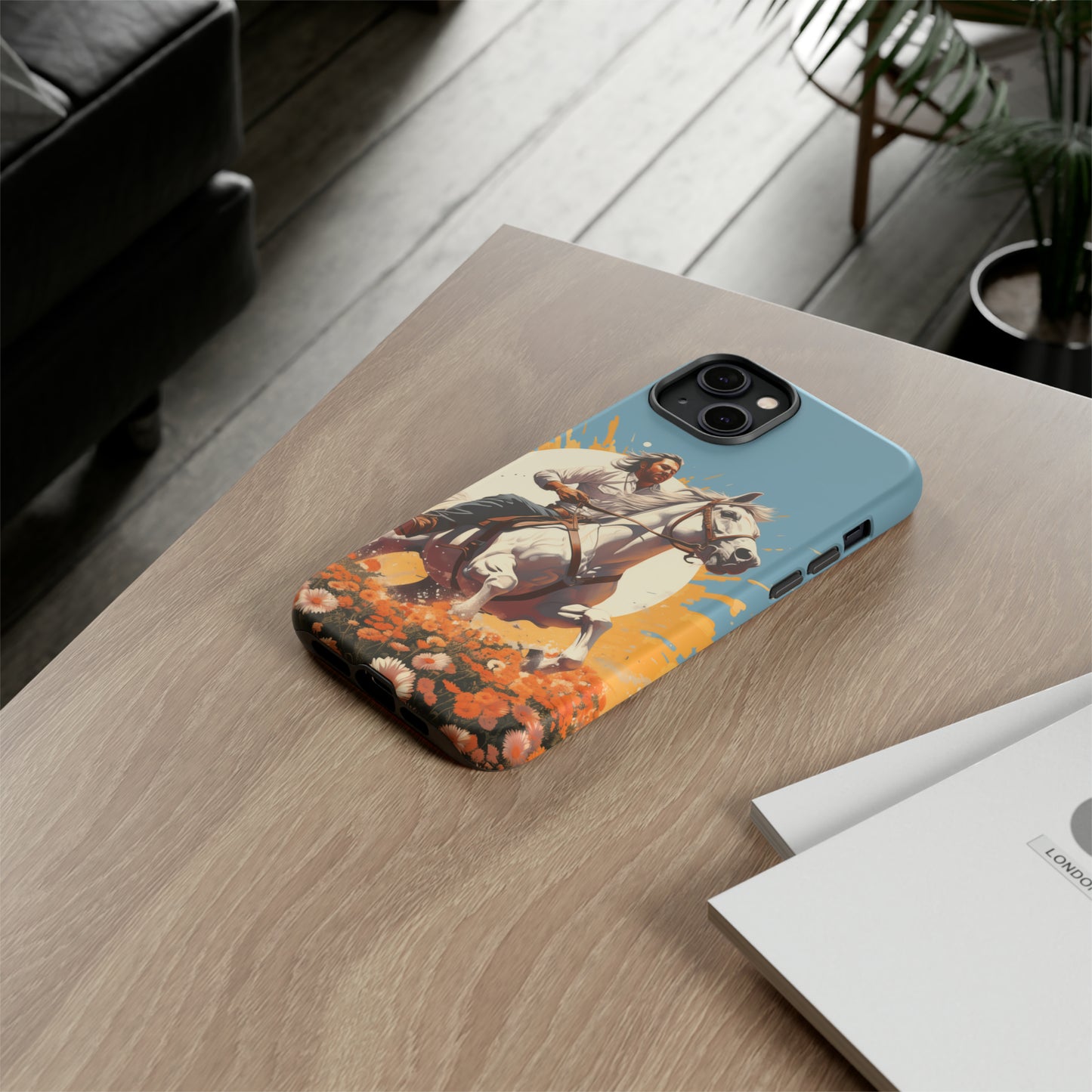 Retro Radiance Unleashed: Behold our Tough Western Cell Phone Case, featuring a vintage white horse and male rider on a vibrant turquoise backdrop. Set in a field of flowers with the sun casting a warm glow, this edition seamlessly blends style with protection. Embrace the past with this retro and stylish accessory. #ElizaSinger #PhoneCase #RetroRadiance
