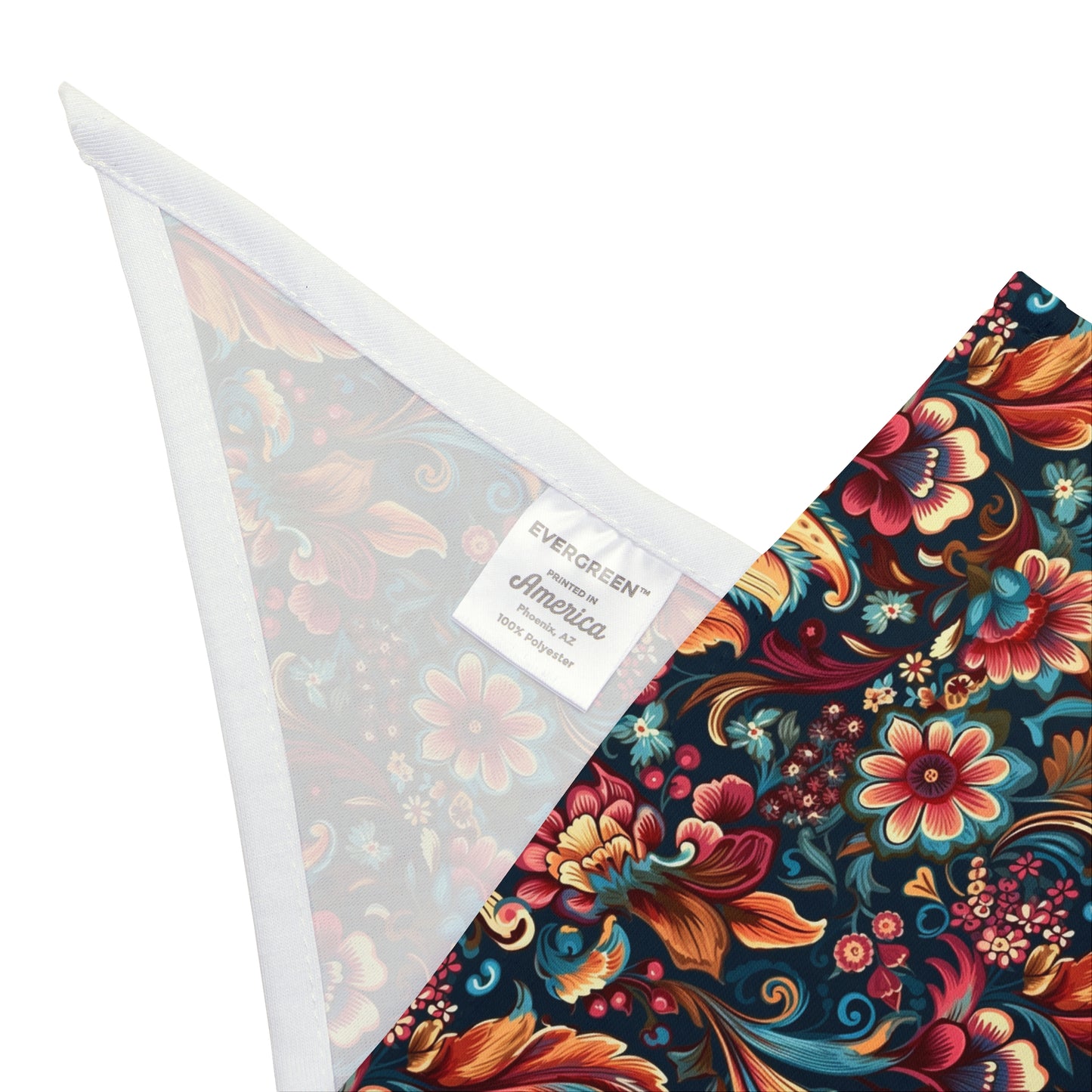 Immerse your dog in a Floral Symphony with our Dog Bandana/Wild Rag. The dark navy background adorned with flowers and paisley details in pink, turquoise, beige, orange, and more creates a harmonious and stylish ensemble. Crafted from soft-spun polyester, this wild rag ensures comfort and style. Also available for humans, exclusively at Eliza Singer.