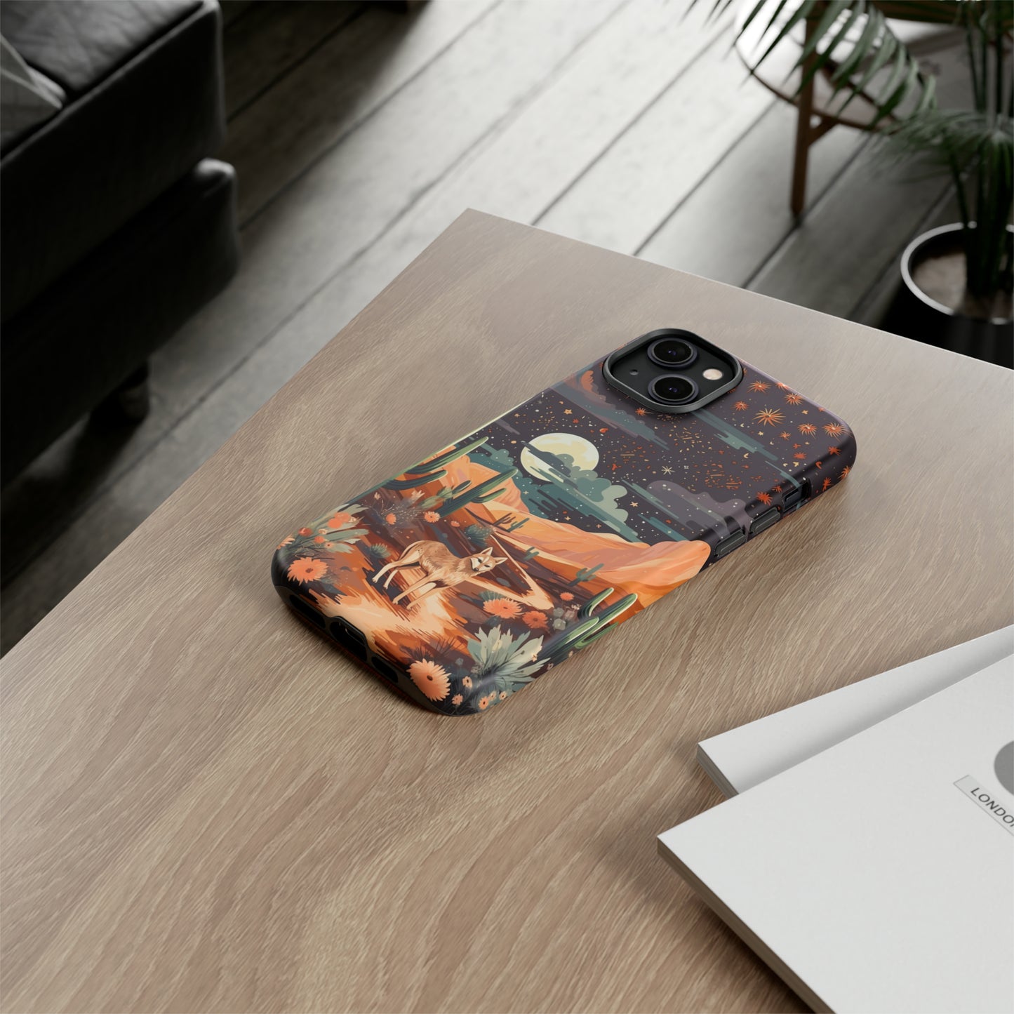 Unveiling our Tough Western Cell Phone Case: Stellar Desert Jackal Edition! Embrace the beauty of the night with a jackal in a desert landscape, under a starry sky, surrounded by cacti. This case provides rugged protection with a touch of celestial elegance.