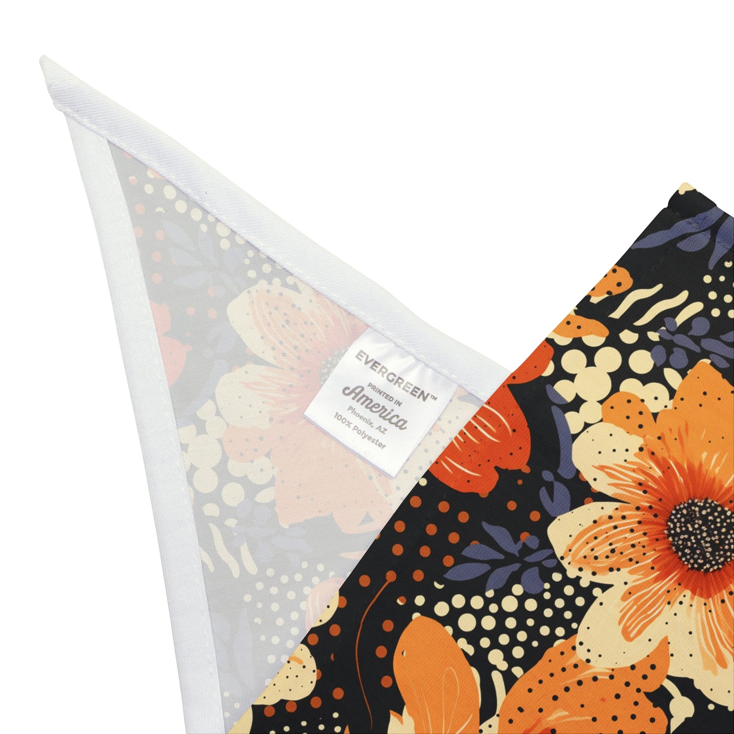 Add a touch of vibrancy to your dog's ensemble with our Abstract Sunset Dog Bandana/Wild Rag. The abstract shades of orange flowers on a black background, with small texture details like polka dots, create a lively and artistic look. Crafted from soft-spun polyester, this wild rag ensures comfort and style. Make a bold statement on every adventure with this exclusive design, available only at Eliza Singer.