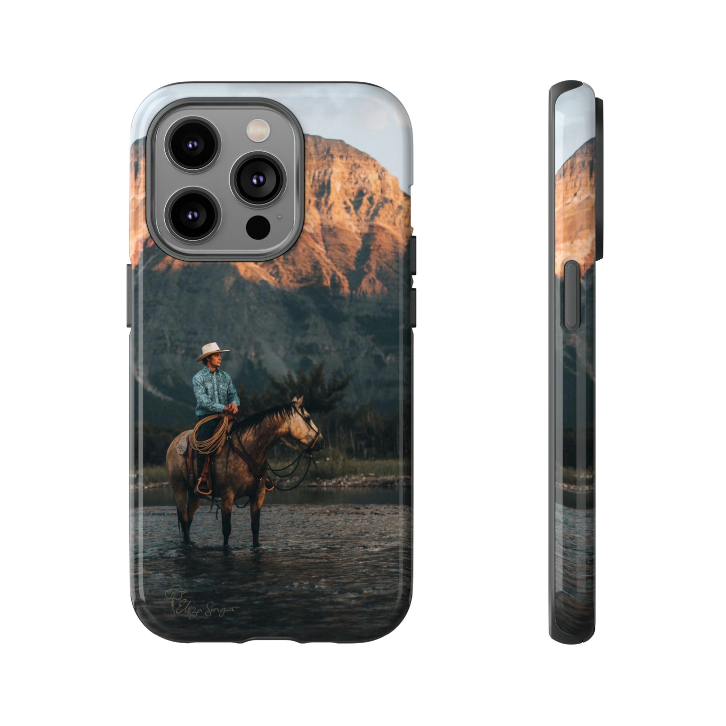 Capture the Wild: Horse Art Western Photo Yellowstone Design iPhone Tough Protective Cover. Featuring a Cowboy amidst Mountains and Buckskin hues, compatible with iPhone 15, 14, 13, XS, XR Pro/Max/Mini/P/Plus. Embrace the Spirit of the West with Style and Durability. #ElizaSinger #PhoneCase #WesternDesign