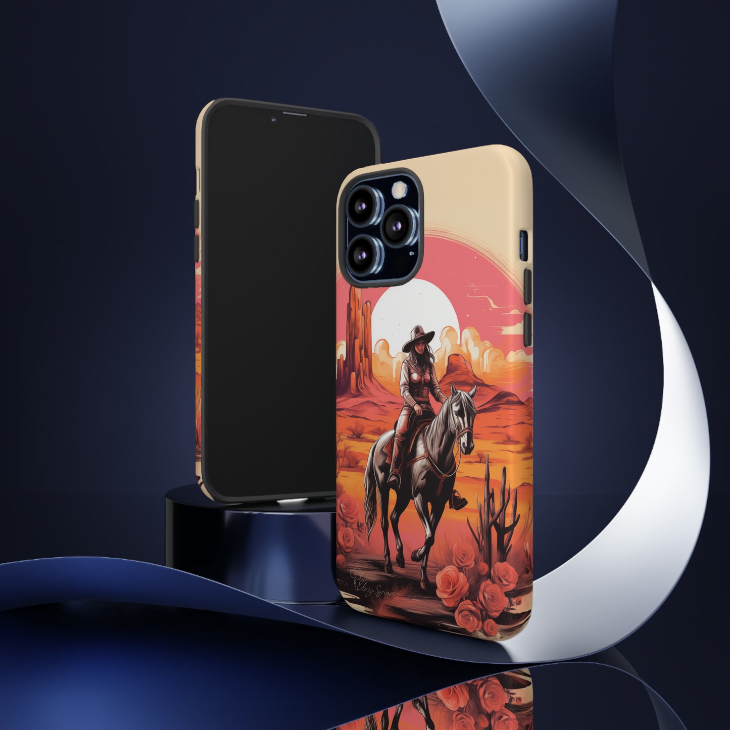 Feminine Adventure Unleashed: Introducing our Tough Western Cell Phone Case, adorned with a stunning design of a cowgirl riding a horse through the desert, surrounded by shades of coral. This unique edition seamlessly combines rugged protection with a touch of feminine flair. Elevate your style with a dash of adventurous charm. #ElizaSinger #PhoneCase #FeminineAdventure