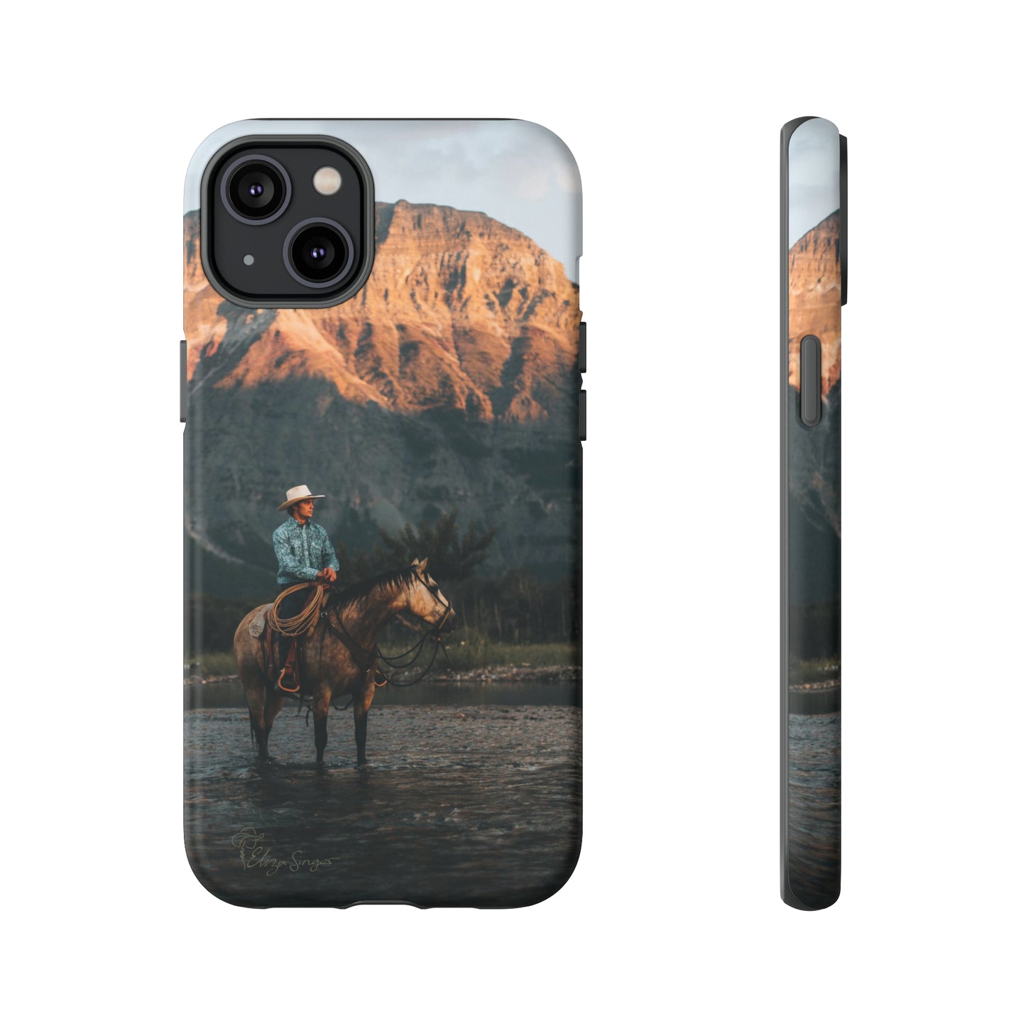 Capture the Wild: Horse Art Western Photo Yellowstone Design iPhone Tough Protective Cover. Featuring a Cowboy amidst Mountains and Buckskin hues, compatible with iPhone 15, 14, 13, XS, XR Pro/Max/Mini/P/Plus. Embrace the Spirit of the West with Style and Durability. #ElizaSinger #PhoneCase #WesternDesign