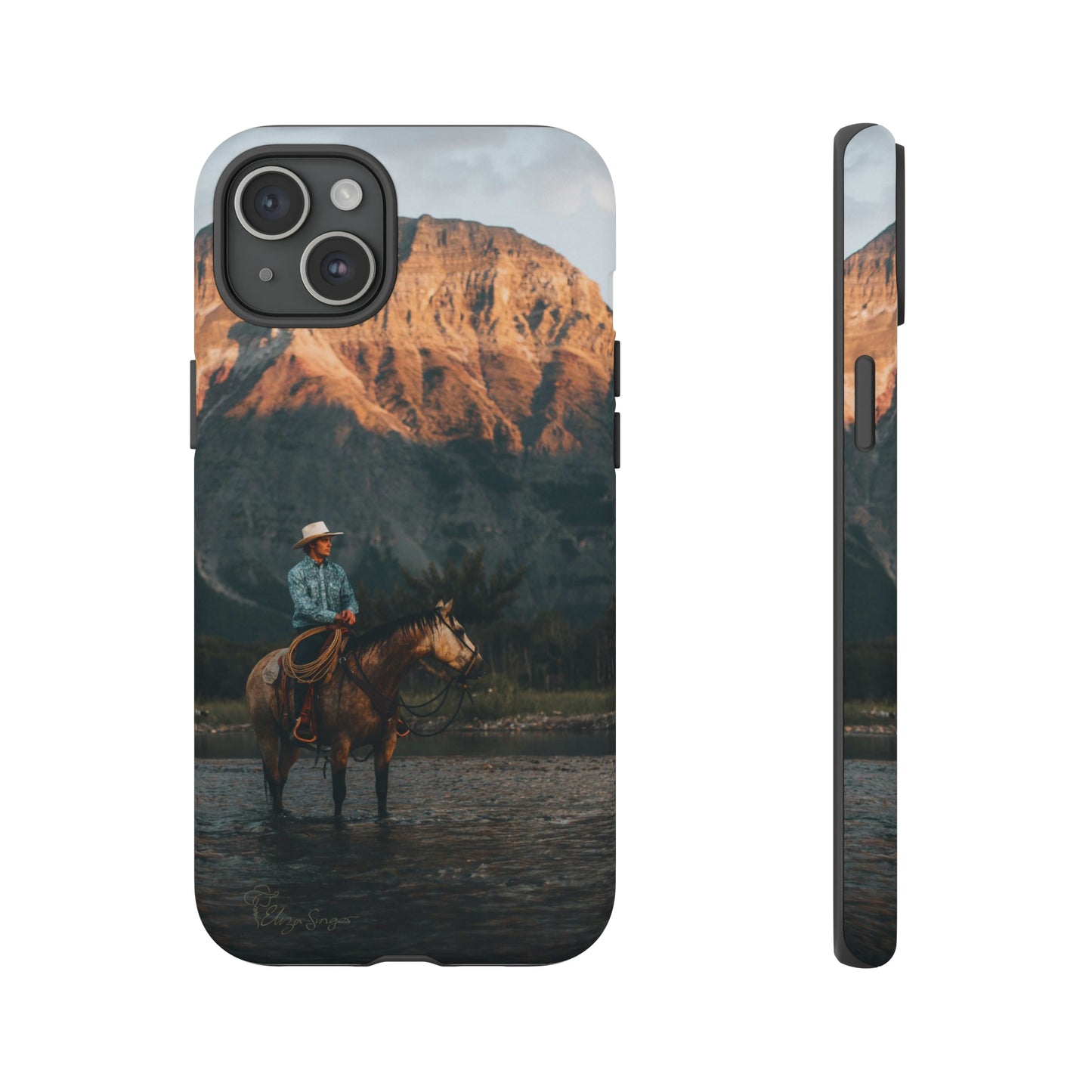 Capture the Wild: Horse Art Western Photo Yellowstone Design iPhone Tough Protective Cover. Featuring a Cowboy amidst Mountains and Buckskin hues, compatible with iPhone 15, 14, 13, XS, XR Pro/Max/Mini/P/Plus. Embrace the Spirit of the West with Style and Durability. #ElizaSinger #PhoneCase #WesternDesign