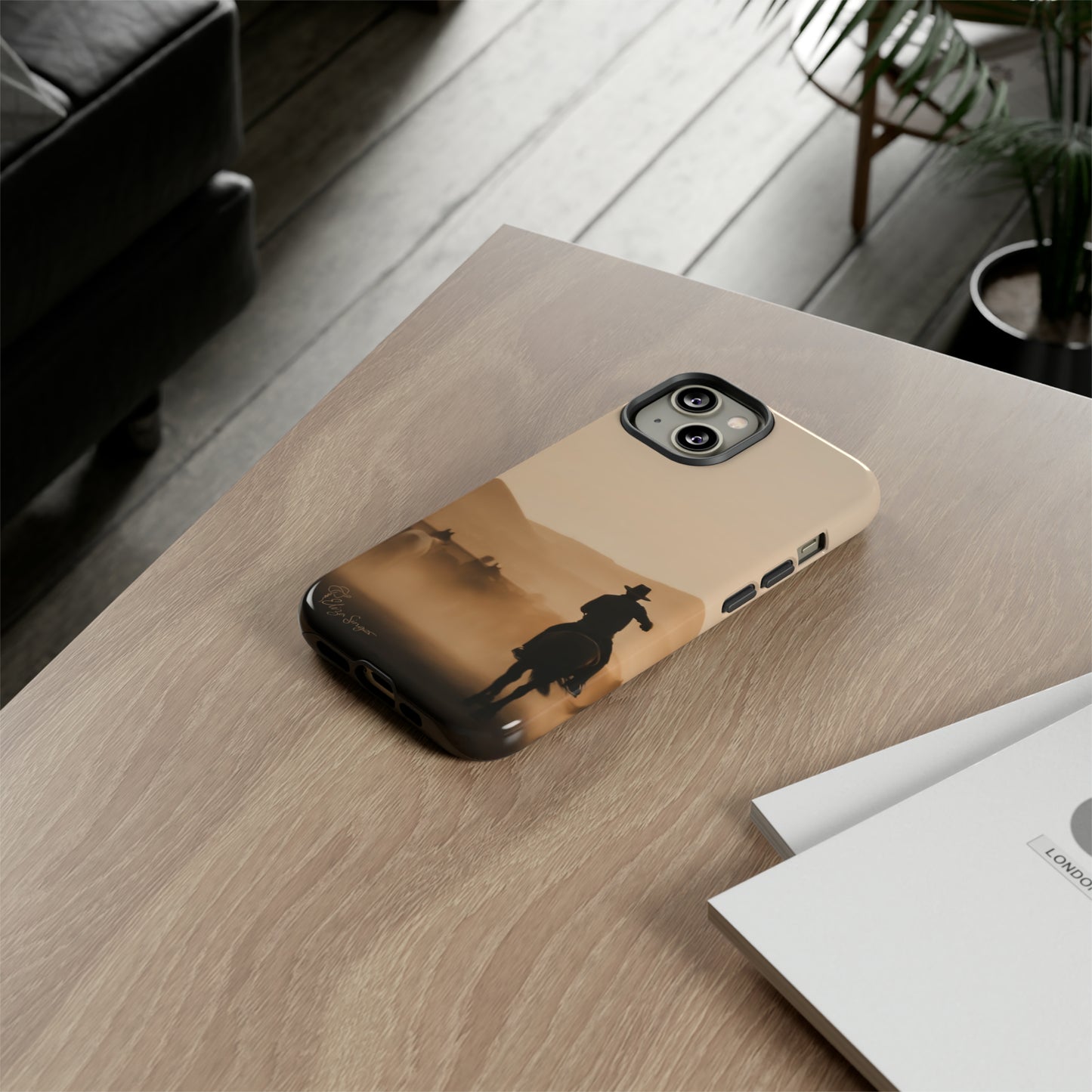 Capture the Western Spirit: Horse Art Western Photo Yellowstone Design iPhone Tough Protective Cover. Featuring a Cowboy amidst Mountains and Buckskin hues. Compatible with iPhone 15, 14, 13, XS, XR Pro/Max/Mini/P/Plus. Bring the Wild West to Your Device with Style and Durability. #ElizaSinger #PhoneCase #WesternDesign