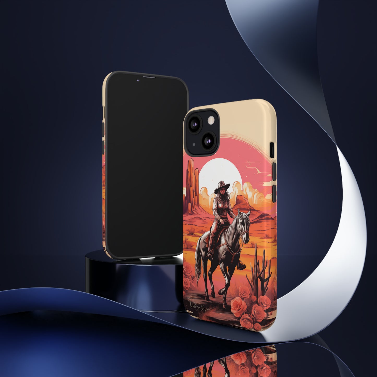 Feminine Adventure Unleashed: Introducing our Tough Western Cell Phone Case, adorned with a stunning design of a cowgirl riding a horse through the desert, surrounded by shades of coral. This unique edition seamlessly combines rugged protection with a touch of feminine flair. Elevate your style with a dash of adventurous charm. #ElizaSinger #PhoneCase #FeminineAdventure