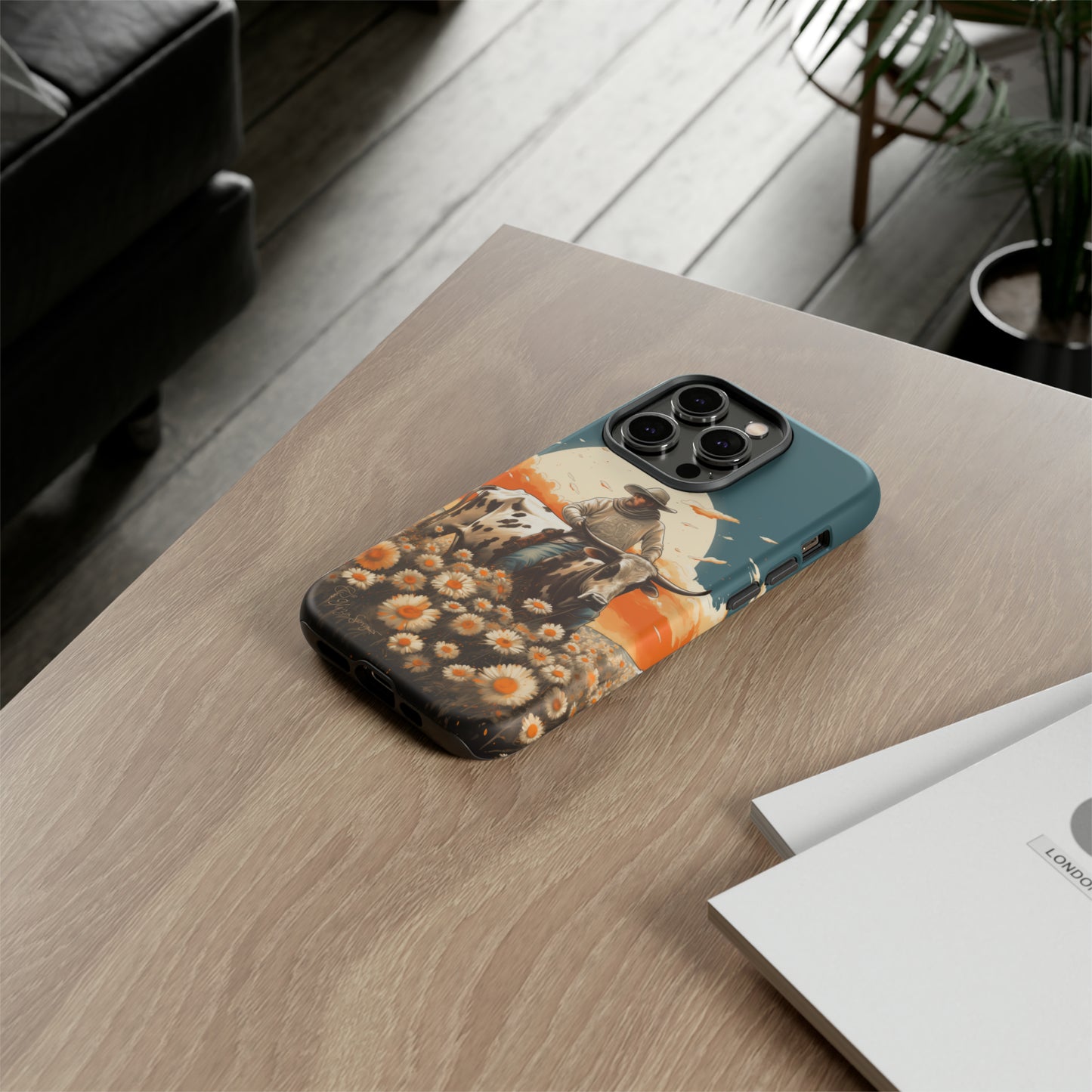 Harmony of Contrasts: Dive into our Tough Cell Phone Case, a visual symphony featuring a bullrider on a black and white dairy cow amidst a vibrant field of flowers. This edition effortlessly merges toughness with artistic flair, offering a unique and captivating contrast. Elevate your phone with rugged elegance. #ElizaSinger #PhoneCase #ContrastHarmony