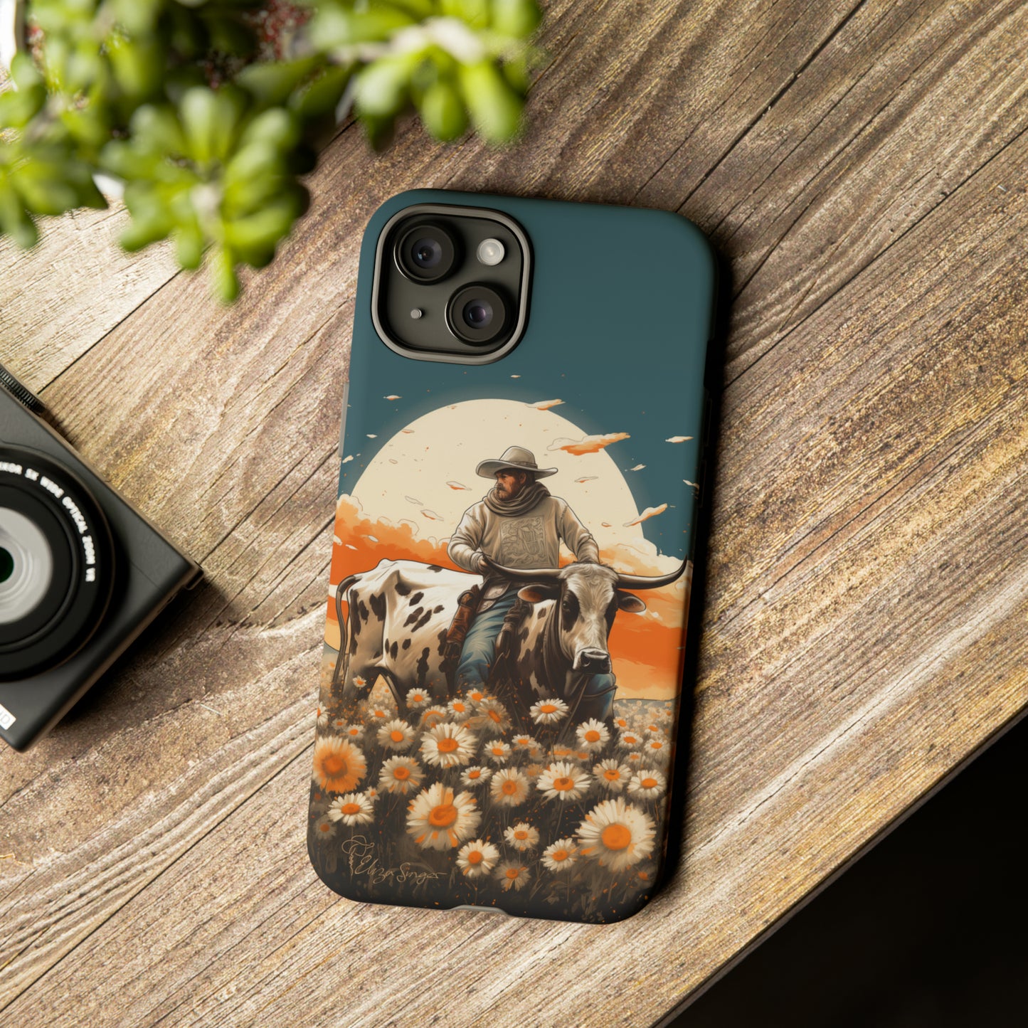 Harmony of Contrasts: Dive into our Tough Cell Phone Case, a visual symphony featuring a bullrider on a black and white dairy cow amidst a vibrant field of flowers. This edition effortlessly merges toughness with artistic flair, offering a unique and captivating contrast. Elevate your phone with rugged elegance. #ElizaSinger #PhoneCase #ContrastHarmony