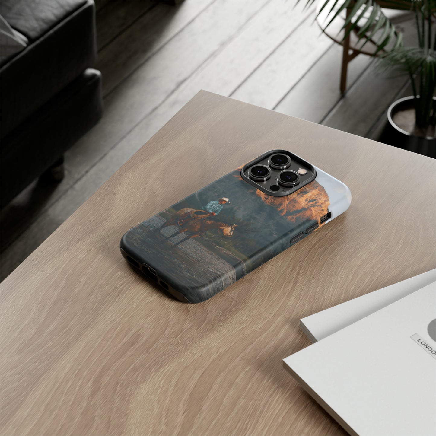 Capture the Wild: Horse Art Western Photo Yellowstone Design iPhone Tough Protective Cover. Featuring a Cowboy amidst Mountains and Buckskin hues, compatible with iPhone 15, 14, 13, XS, XR Pro/Max/Mini/P/Plus. Embrace the Spirit of the West with Style and Durability. #ElizaSinger #PhoneCase #WesternDesign