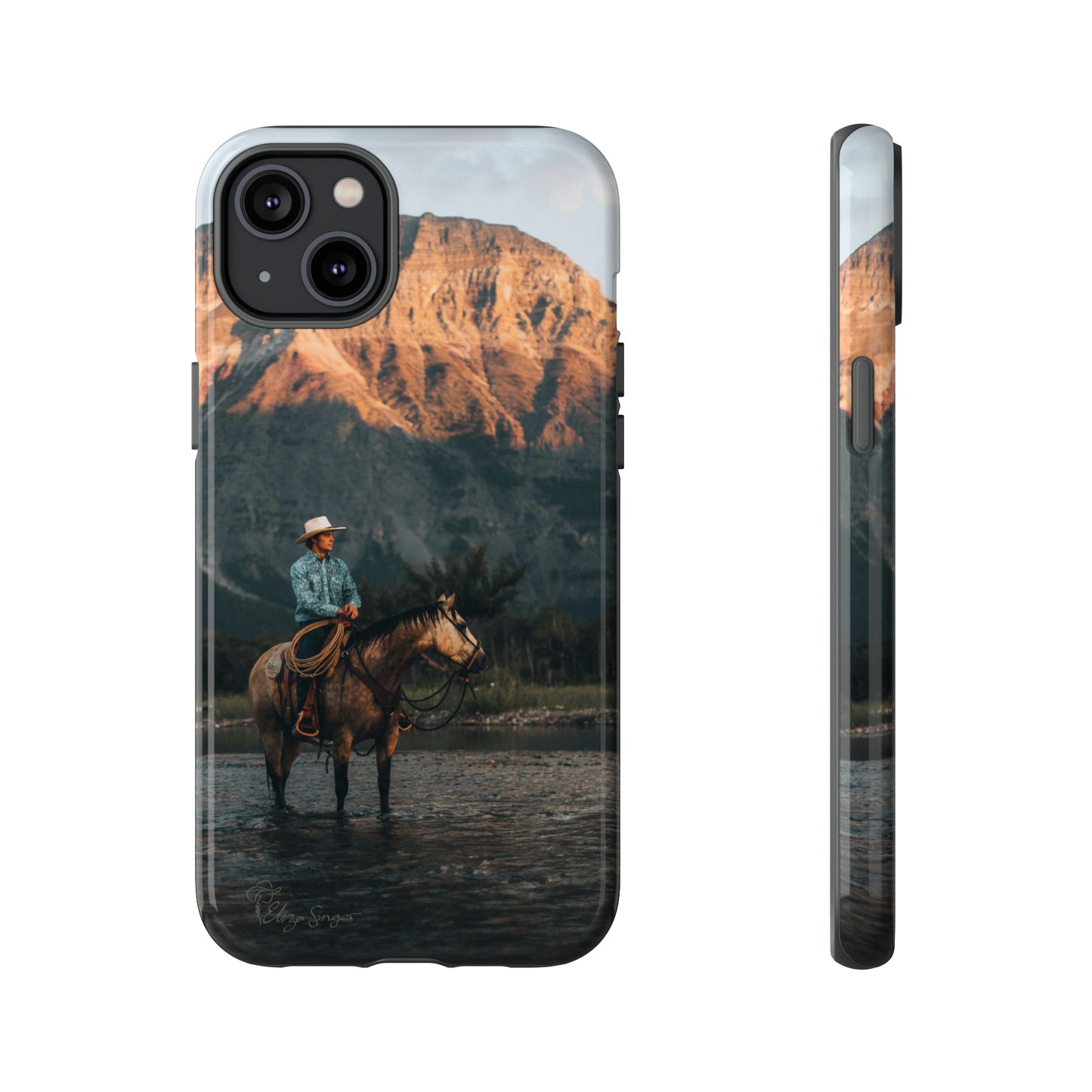 Capture the Wild: Horse Art Western Photo Yellowstone Design iPhone Tough Protective Cover. Featuring a Cowboy amidst Mountains and Buckskin hues, compatible with iPhone 15, 14, 13, XS, XR Pro/Max/Mini/P/Plus. Embrace the Spirit of the West with Style and Durability. #ElizaSinger #PhoneCase #WesternDesign
