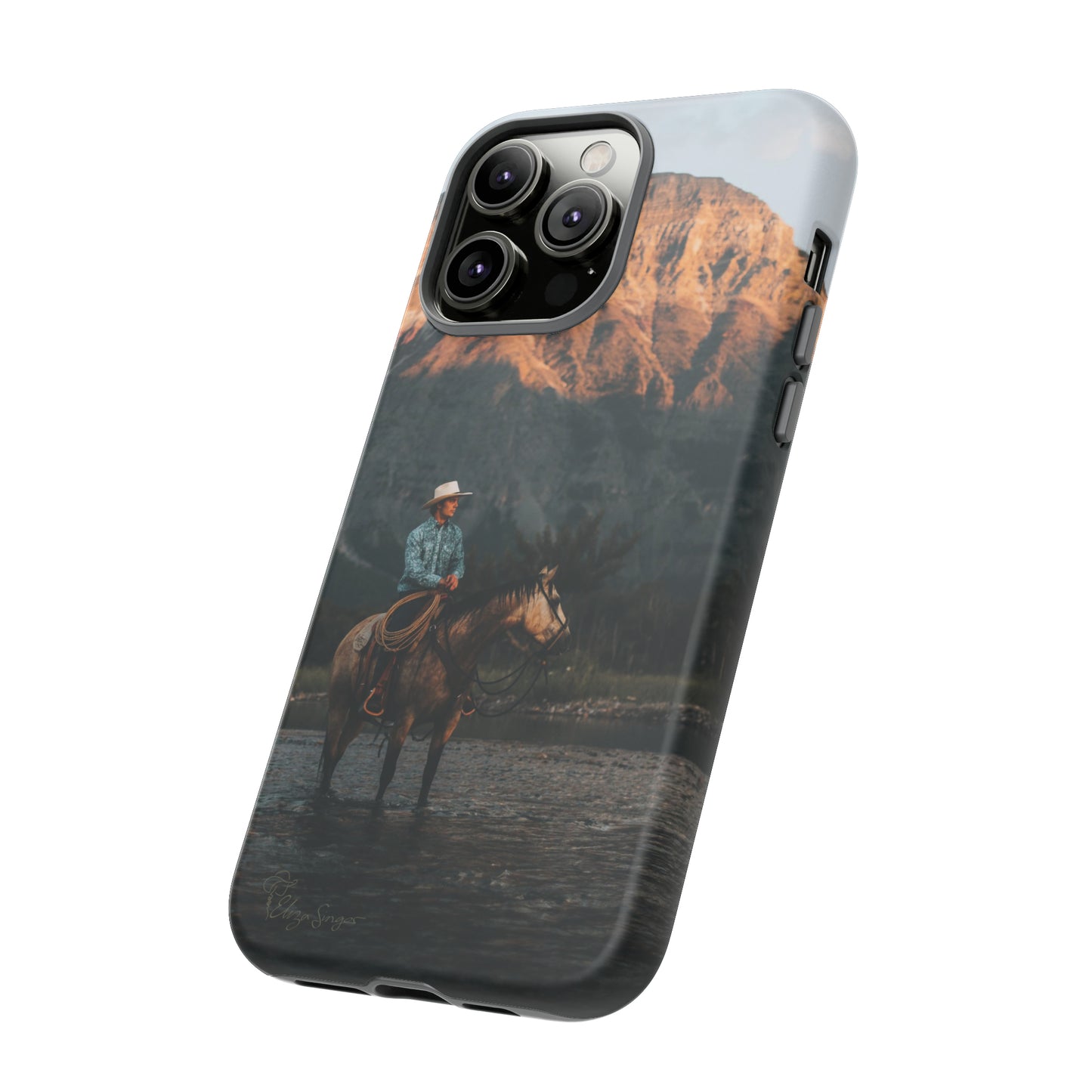 Capture the Wild: Horse Art Western Photo Yellowstone Design iPhone Tough Protective Cover. Featuring a Cowboy amidst Mountains and Buckskin hues, compatible with iPhone 15, 14, 13, XS, XR Pro/Max/Mini/P/Plus. Embrace the Spirit of the West with Style and Durability. #ElizaSinger #PhoneCase #WesternDesign