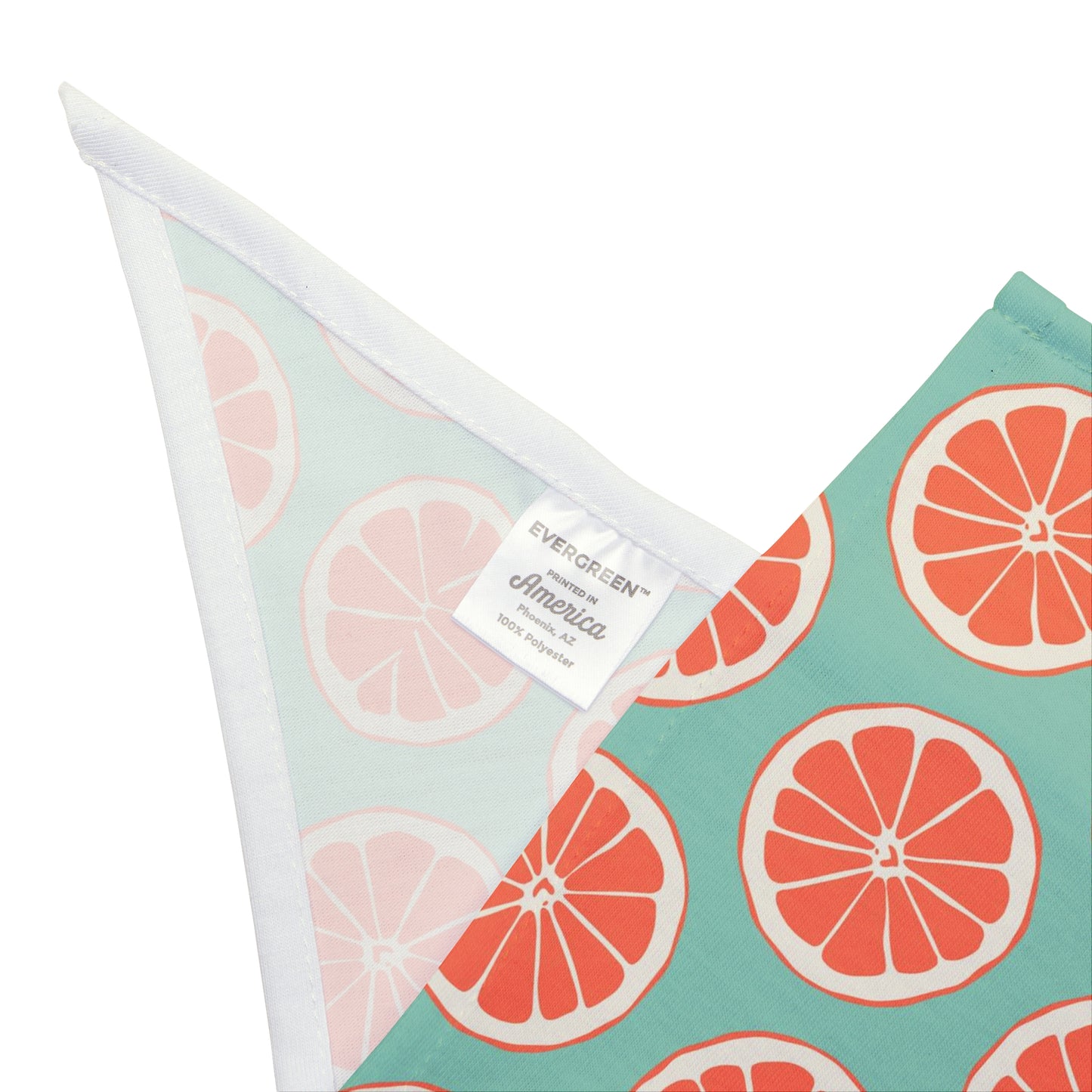 Bring a burst of summer to your dog's style with our Summer Citrus Dog Bandana/Wild Rag. Featuring grapefruit on a pastel duck egg color background, this design adds a refreshing touch. Crafted from soft-spun polyester, this wild rag ensures comfort and style, making it perfect for sunny adventures. Exclusively available at Eliza Singer.
