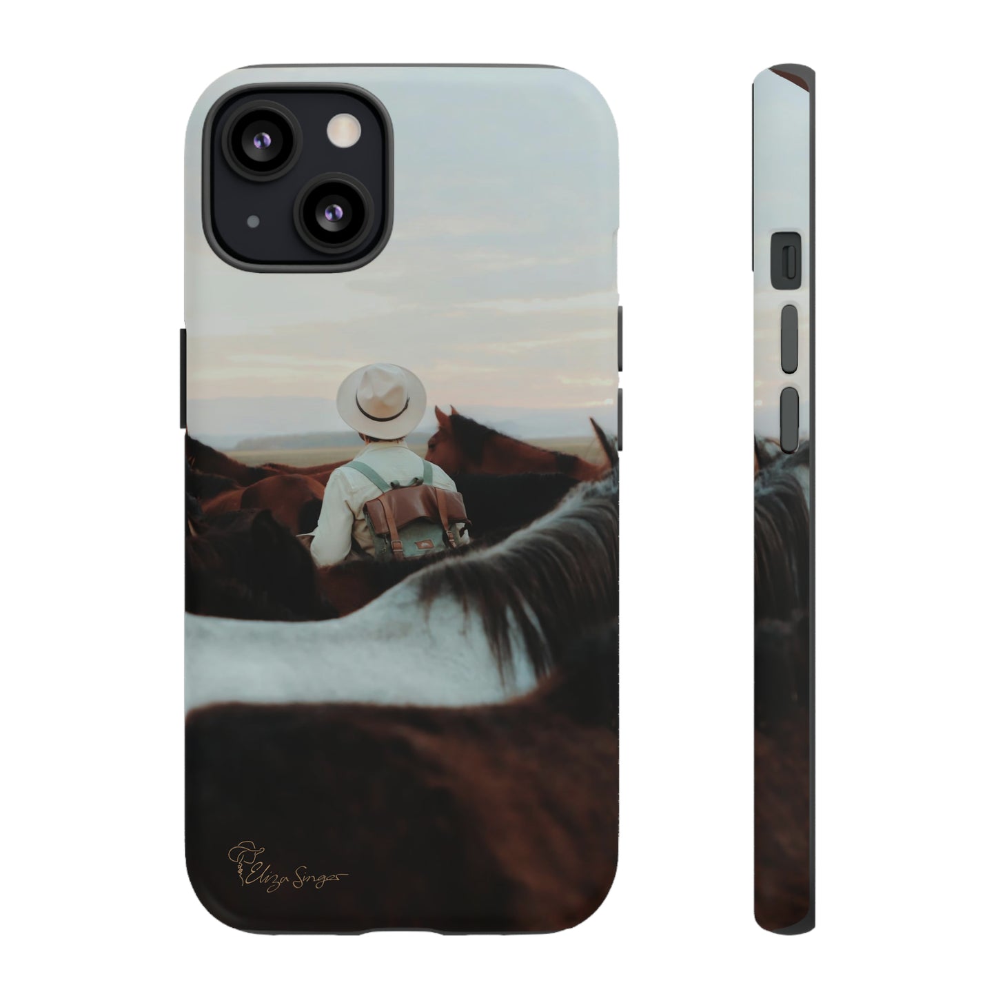 Ride into the Wild: Horse Art Western Photo Yellowstone Design iPhone Tough Protective Cover. Featuring a Cowboy amidst Mountains and Buckskin hues. Compatible with iPhone 15, 14, 13, XS, XR Pro/Max/Mini/P/Plus. Embrace the Spirit of the West with Style and Durability. #ElizaSinger #PhoneCase #WesternDesign