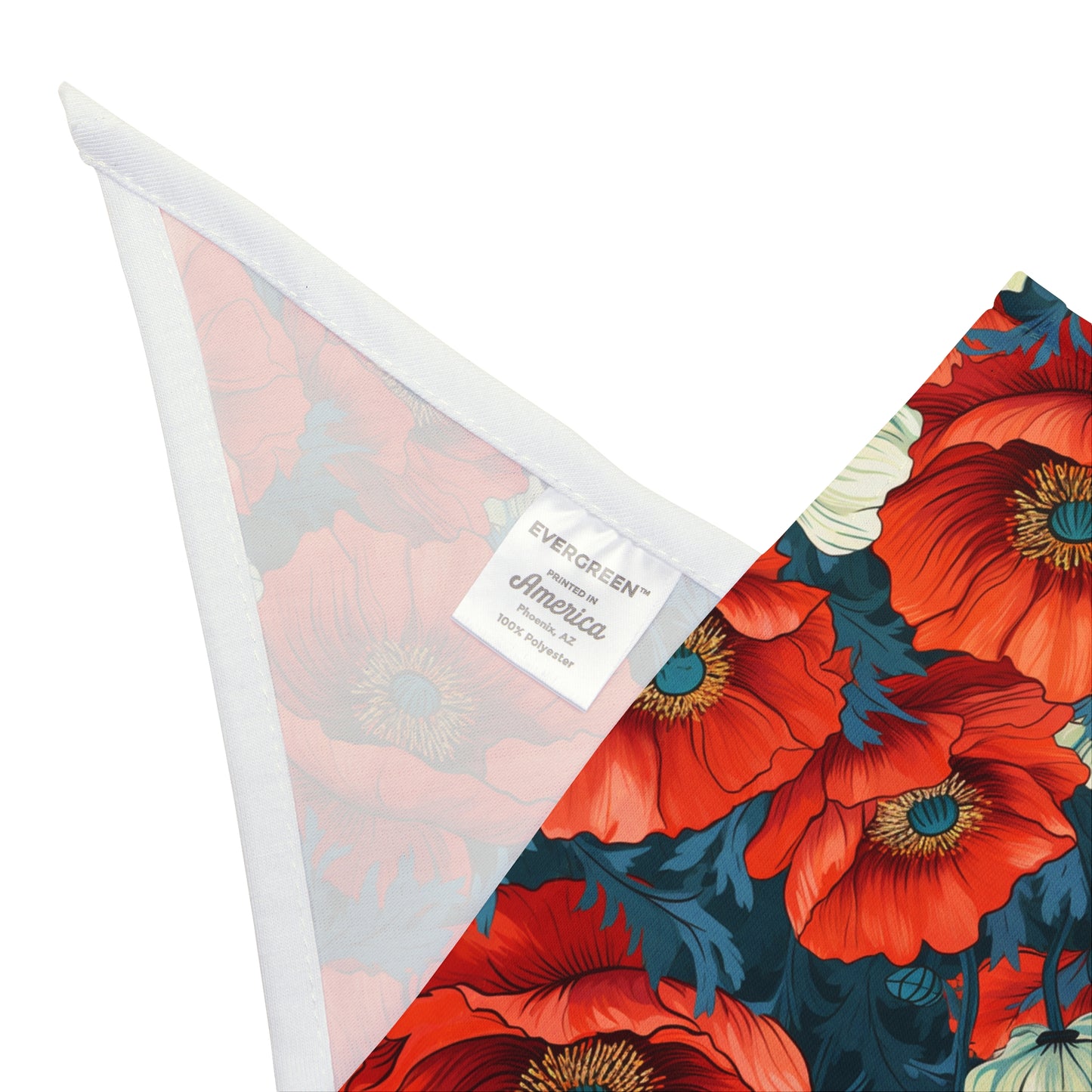 "Step into a field of vibrant charm with our Poppy Fields Dog Bandana/Wild Rag. Red poppies with touches of white on a vibrant blue background create a lively and eye-catching look. Crafted from soft-spun polyester, this bandana/wild rag ensures both comfort and durability. Explore exclusive pet fashion at Eliza Singer, where each piece is a celebration of nature's vibrant beauty, designed for the discerning pet enthusiast.