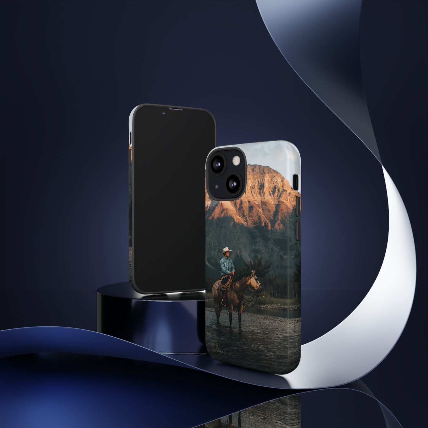 Capture the Wild: Horse Art Western Photo Yellowstone Design iPhone Tough Protective Cover. Featuring a Cowboy amidst Mountains and Buckskin hues, compatible with iPhone 15, 14, 13, XS, XR Pro/Max/Mini/P/Plus. Embrace the Spirit of the West with Style and Durability. #ElizaSinger #PhoneCase #WesternDesign