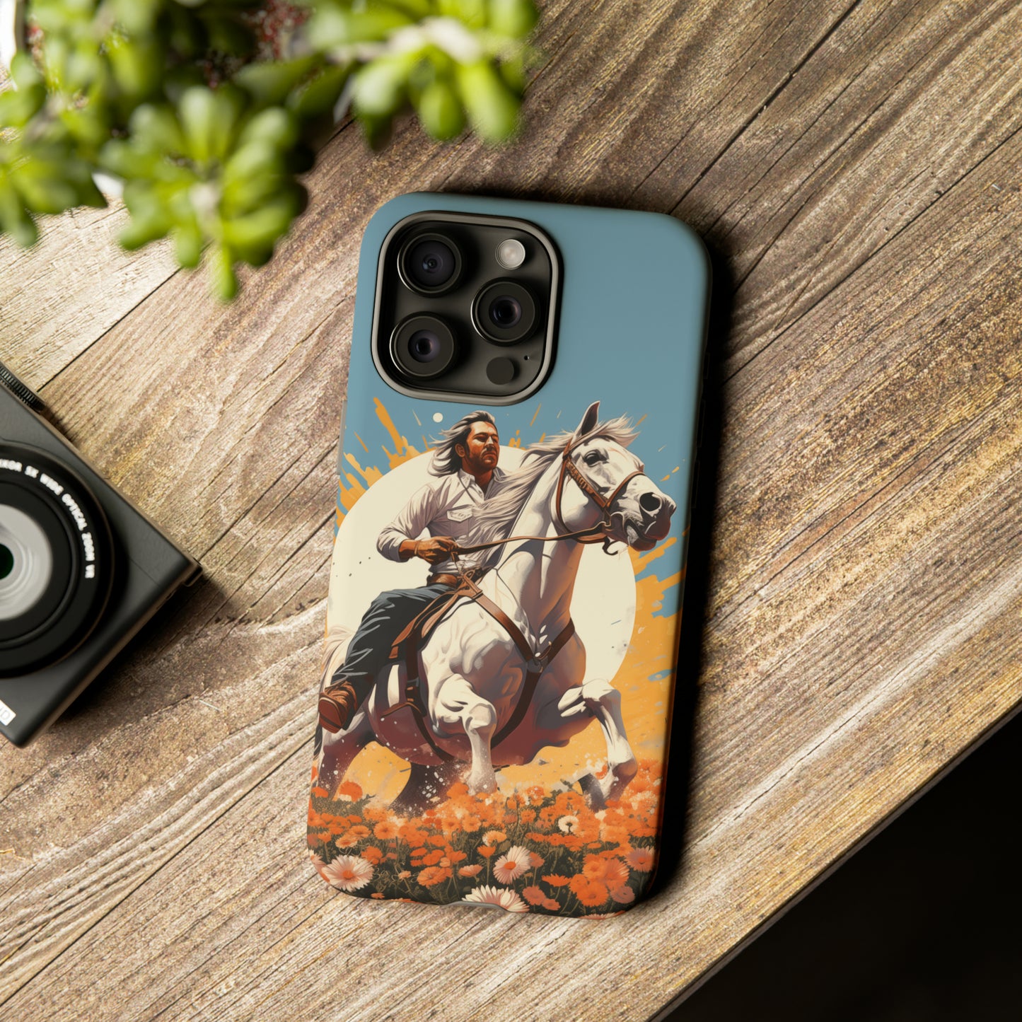 Retro Radiance Unleashed: Behold our Tough Western Cell Phone Case, featuring a vintage white horse and male rider on a vibrant turquoise backdrop. Set in a field of flowers with the sun casting a warm glow, this edition seamlessly blends style with protection. Embrace the past with this retro and stylish accessory. #ElizaSinger #PhoneCase #RetroRadiance
