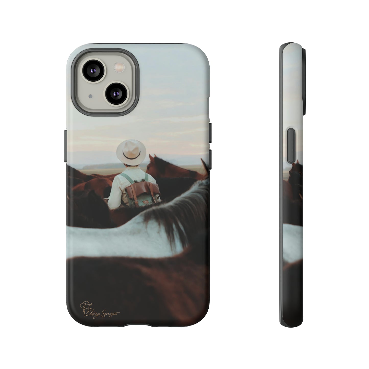 Ride into the Wild: Horse Art Western Photo Yellowstone Design iPhone Tough Protective Cover. Featuring a Cowboy amidst Mountains and Buckskin hues. Compatible with iPhone 15, 14, 13, XS, XR Pro/Max/Mini/P/Plus. Embrace the Spirit of the West with Style and Durability. #ElizaSinger #PhoneCase #WesternDesign