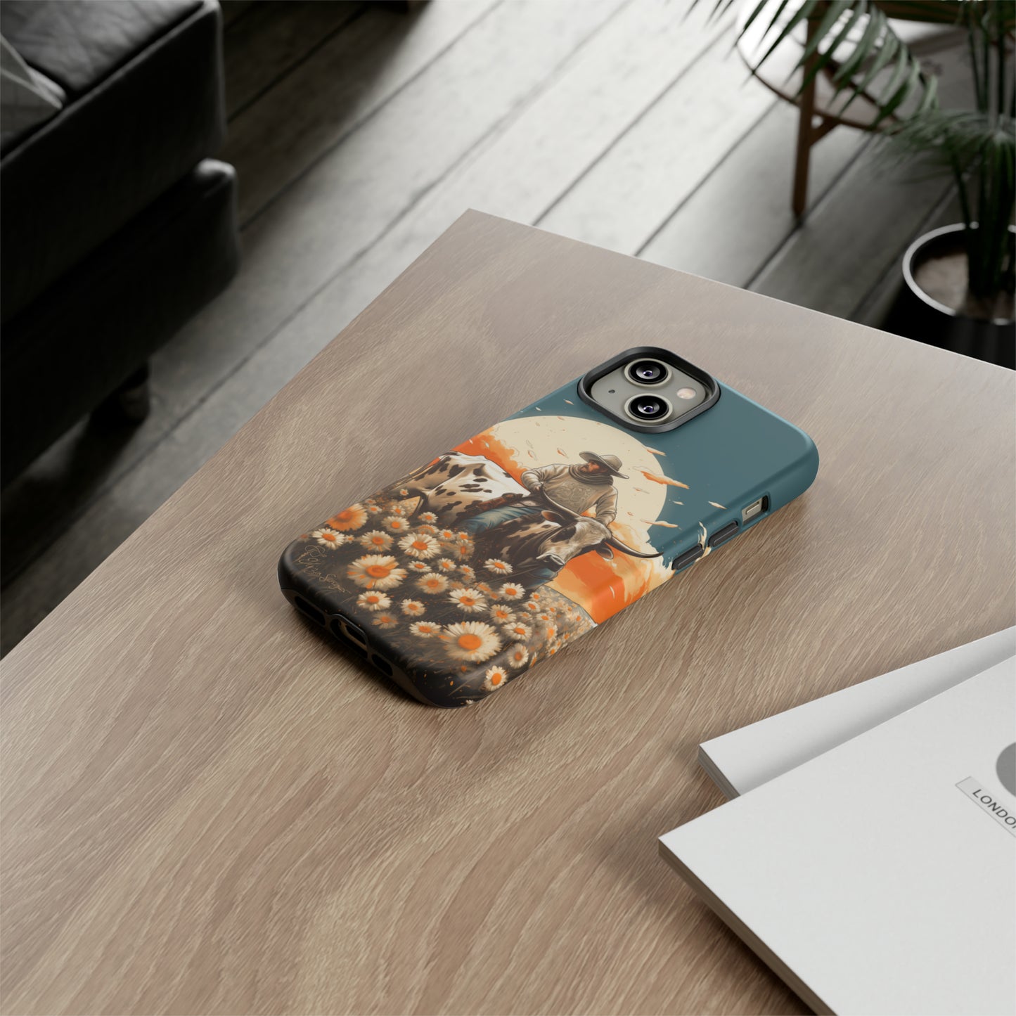 Harmony of Contrasts: Dive into our Tough Cell Phone Case, a visual symphony featuring a bullrider on a black and white dairy cow amidst a vibrant field of flowers. This edition effortlessly merges toughness with artistic flair, offering a unique and captivating contrast. Elevate your phone with rugged elegance. #ElizaSinger #PhoneCase #ContrastHarmony