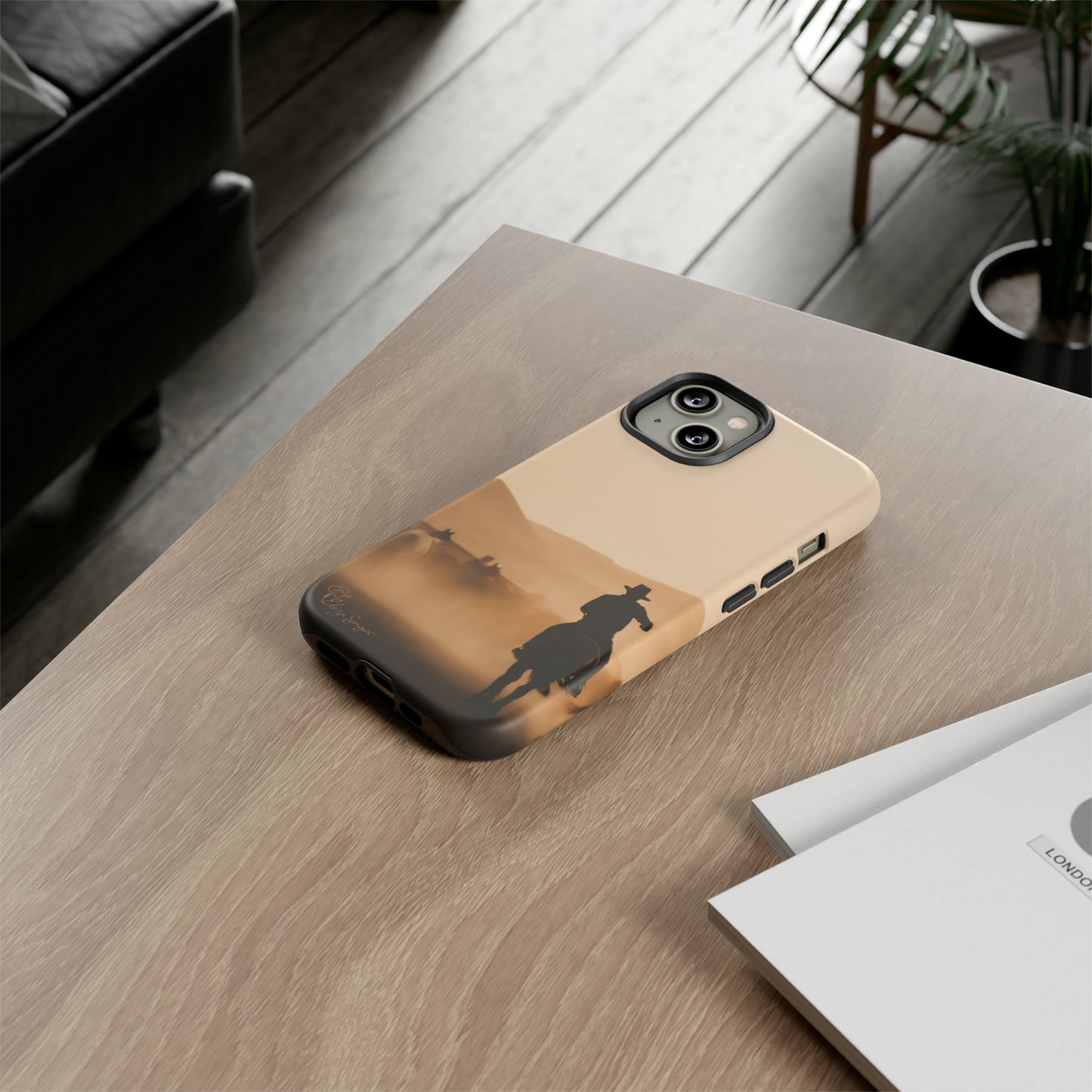 Capture the Western Spirit: Horse Art Western Photo Yellowstone Design iPhone Tough Protective Cover. Featuring a Cowboy amidst Mountains and Buckskin hues. Compatible with iPhone 15, 14, 13, XS, XR Pro/Max/Mini/P/Plus. Bring the Wild West to Your Device with Style and Durability. #ElizaSinger #PhoneCase #WesternDesign