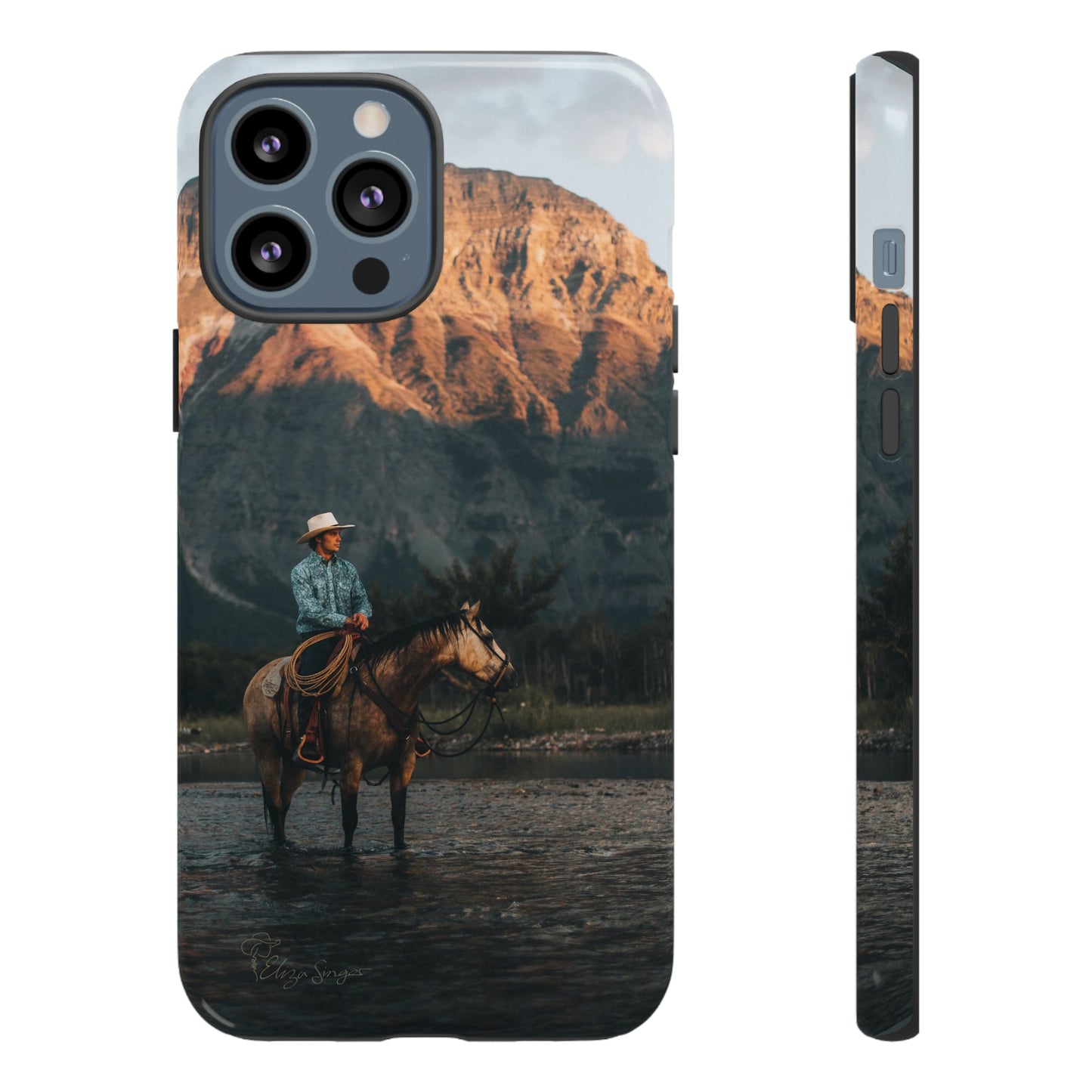 Capture the Wild: Horse Art Western Photo Yellowstone Design iPhone Tough Protective Cover. Featuring a Cowboy amidst Mountains and Buckskin hues, compatible with iPhone 15, 14, 13, XS, XR Pro/Max/Mini/P/Plus. Embrace the Spirit of the West with Style and Durability. #ElizaSinger #PhoneCase #WesternDesign