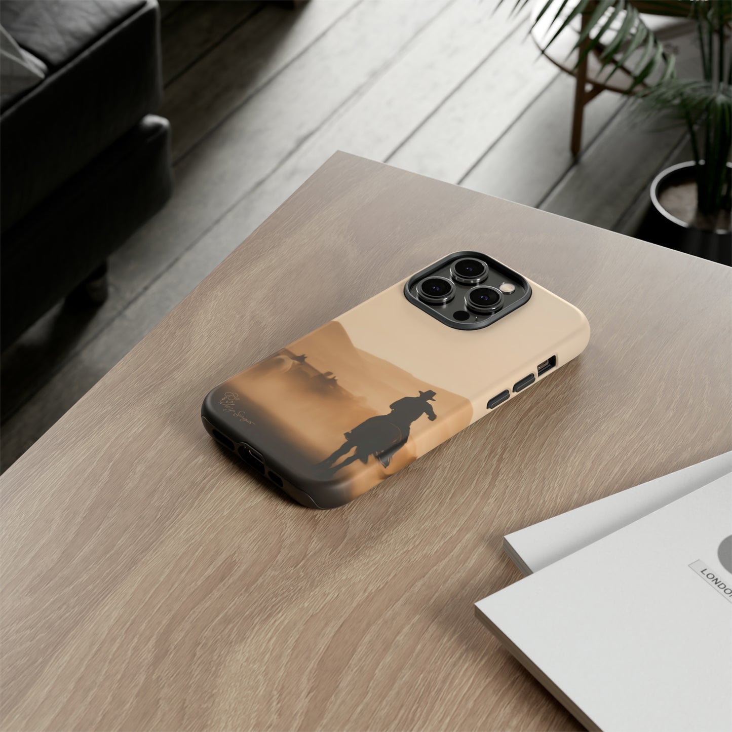 Capture the Western Spirit: Horse Art Western Photo Yellowstone Design iPhone Tough Protective Cover. Featuring a Cowboy amidst Mountains and Buckskin hues. Compatible with iPhone 15, 14, 13, XS, XR Pro/Max/Mini/P/Plus. Bring the Wild West to Your Device with Style and Durability. #ElizaSinger #PhoneCase #WesternDesign