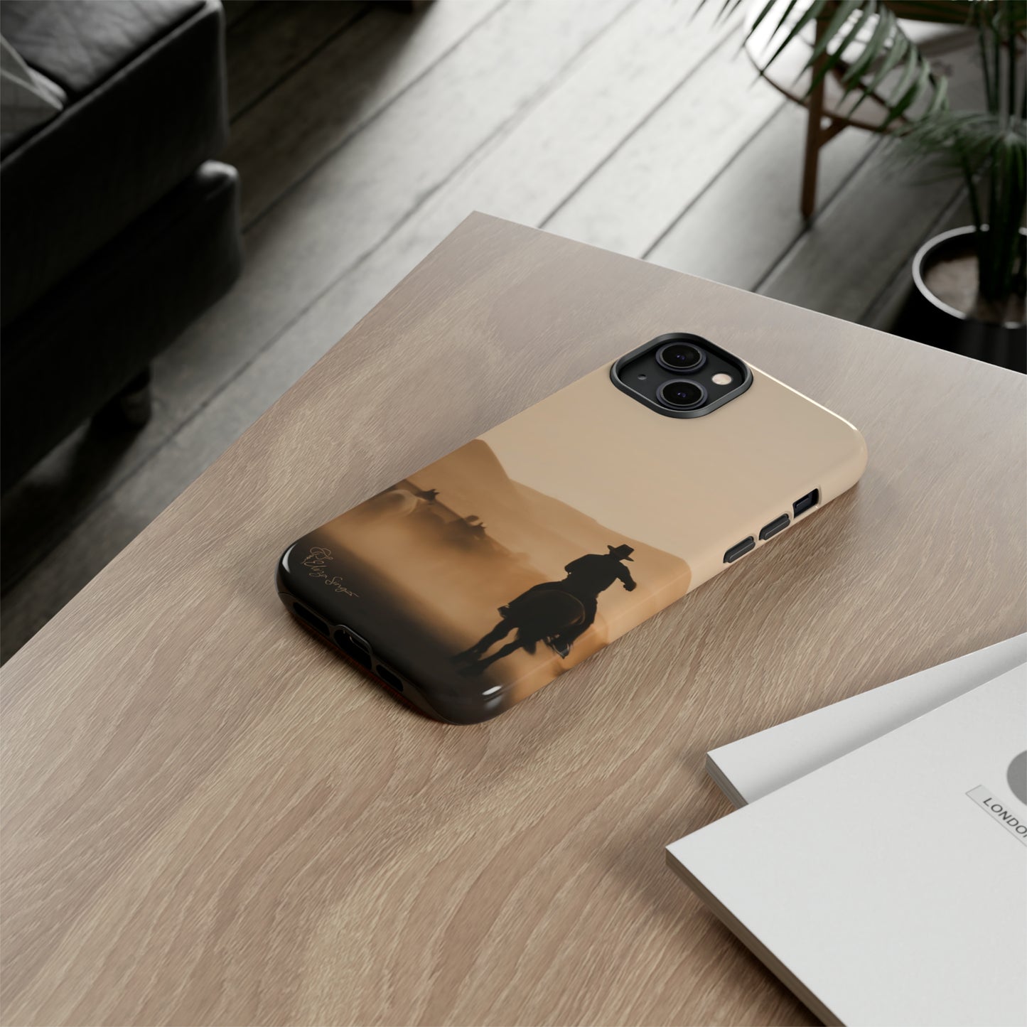 Capture the Western Spirit: Horse Art Western Photo Yellowstone Design iPhone Tough Protective Cover. Featuring a Cowboy amidst Mountains and Buckskin hues. Compatible with iPhone 15, 14, 13, XS, XR Pro/Max/Mini/P/Plus. Bring the Wild West to Your Device with Style and Durability. #ElizaSinger #PhoneCase #WesternDesign