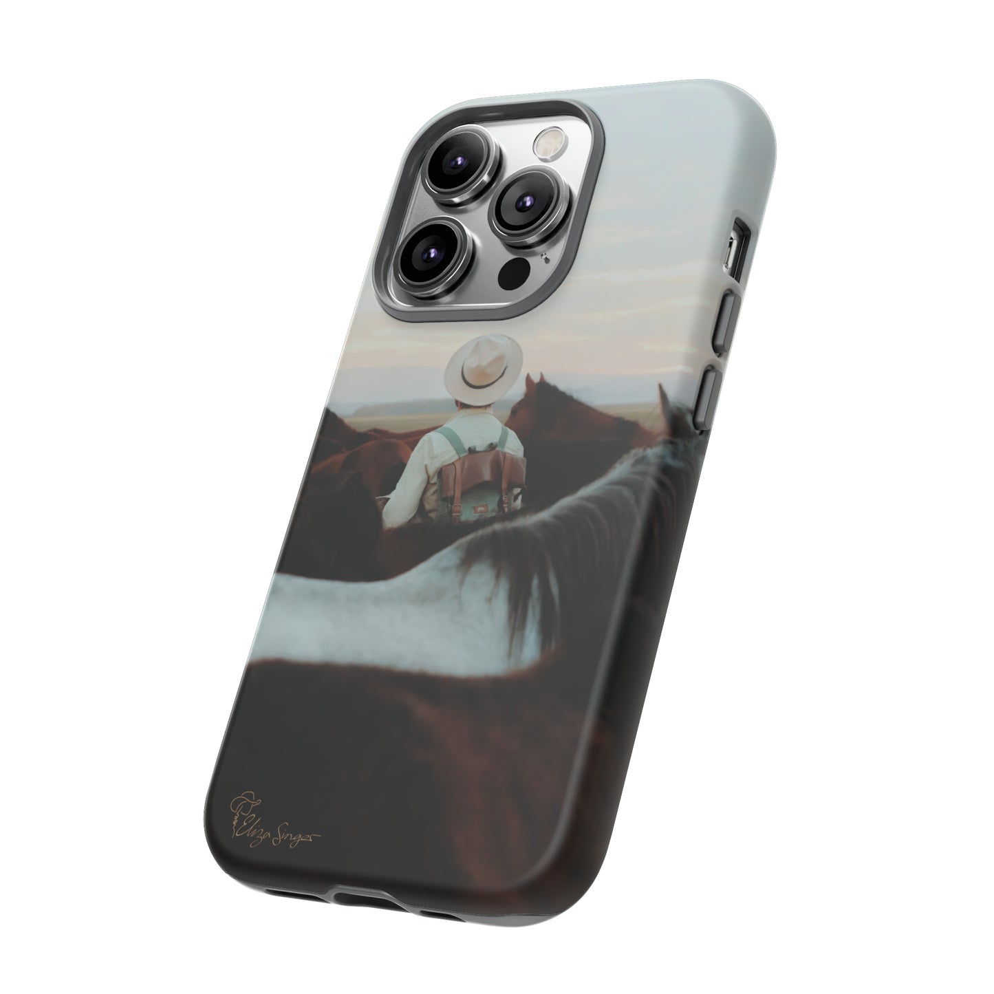 Ride into the Wild: Horse Art Western Photo Yellowstone Design iPhone Tough Protective Cover. Featuring a Cowboy amidst Mountains and Buckskin hues. Compatible with iPhone 15, 14, 13, XS, XR Pro/Max/Mini/P/Plus. Embrace the Spirit of the West with Style and Durability. #ElizaSinger #PhoneCase #WesternDesign