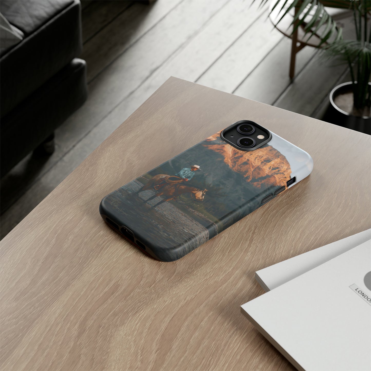 Capture the Wild: Horse Art Western Photo Yellowstone Design iPhone Tough Protective Cover. Featuring a Cowboy amidst Mountains and Buckskin hues, compatible with iPhone 15, 14, 13, XS, XR Pro/Max/Mini/P/Plus. Embrace the Spirit of the West with Style and Durability. #ElizaSinger #PhoneCase #WesternDesign