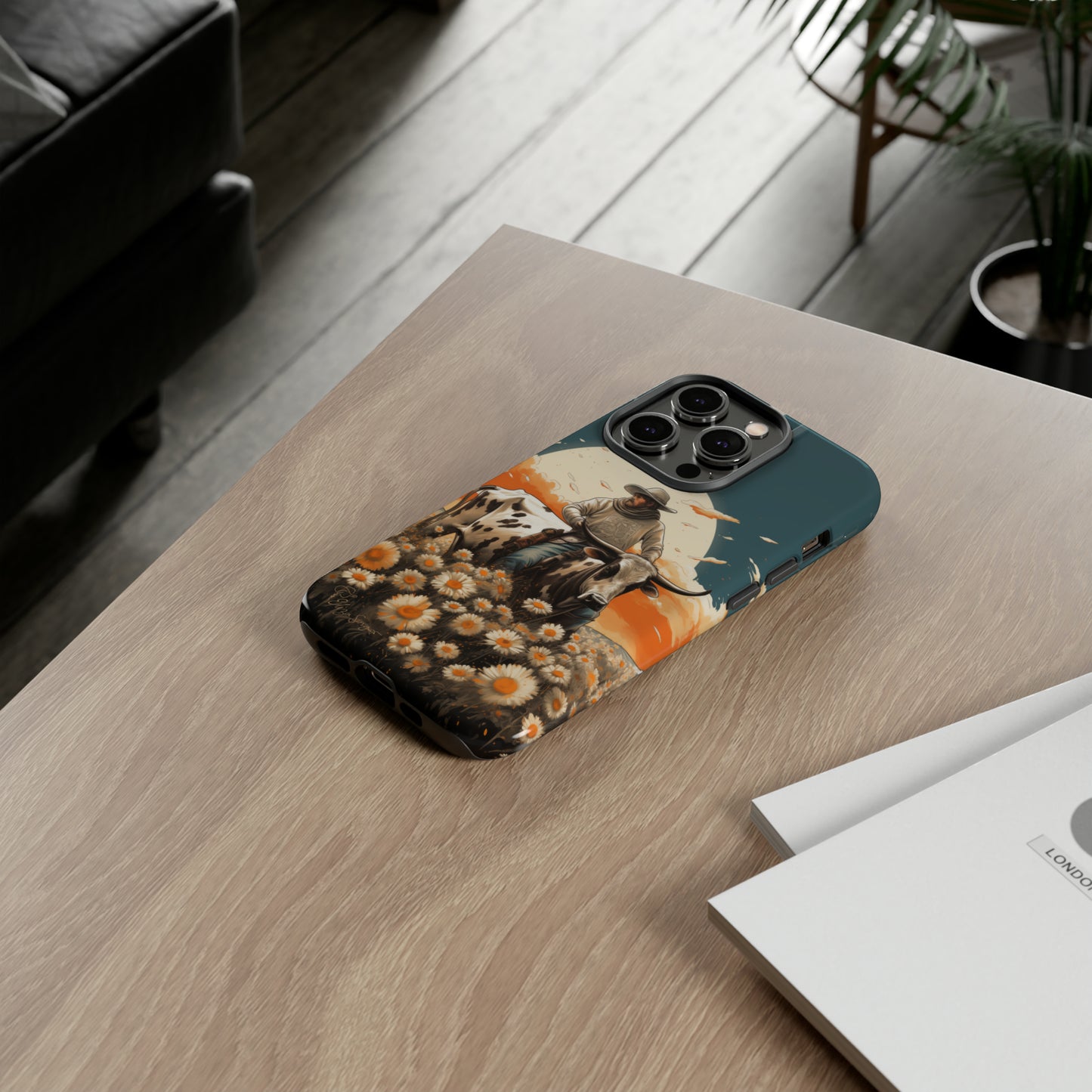 Harmony of Contrasts: Dive into our Tough Cell Phone Case, a visual symphony featuring a bullrider on a black and white dairy cow amidst a vibrant field of flowers. This edition effortlessly merges toughness with artistic flair, offering a unique and captivating contrast. Elevate your phone with rugged elegance. #ElizaSinger #PhoneCase #ContrastHarmony