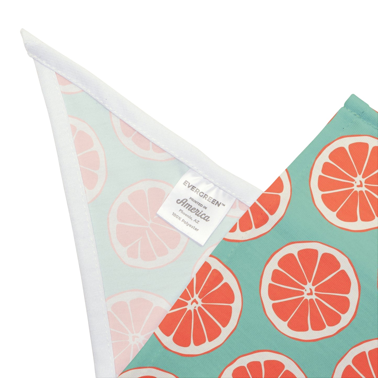 Bring a burst of summer to your dog's style with our Summer Citrus Dog Bandana/Wild Rag. Featuring grapefruit on a pastel duck egg color background, this design adds a refreshing touch. Crafted from soft-spun polyester, this wild rag ensures comfort and style, making it perfect for sunny adventures. Exclusively available at Eliza Singer.