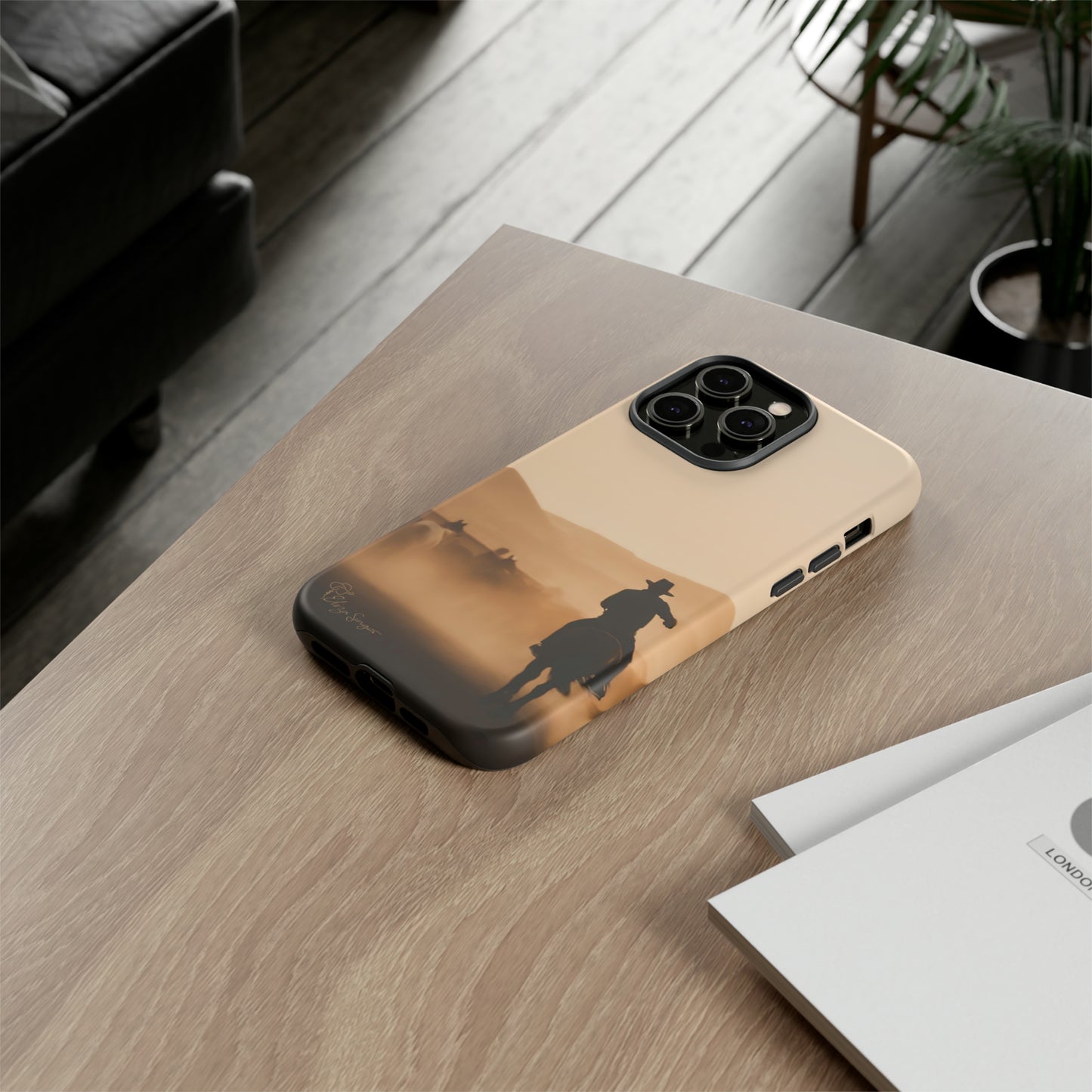Capture the Western Spirit: Horse Art Western Photo Yellowstone Design iPhone Tough Protective Cover. Featuring a Cowboy amidst Mountains and Buckskin hues. Compatible with iPhone 15, 14, 13, XS, XR Pro/Max/Mini/P/Plus. Bring the Wild West to Your Device with Style and Durability. #ElizaSinger #PhoneCase #WesternDesign
