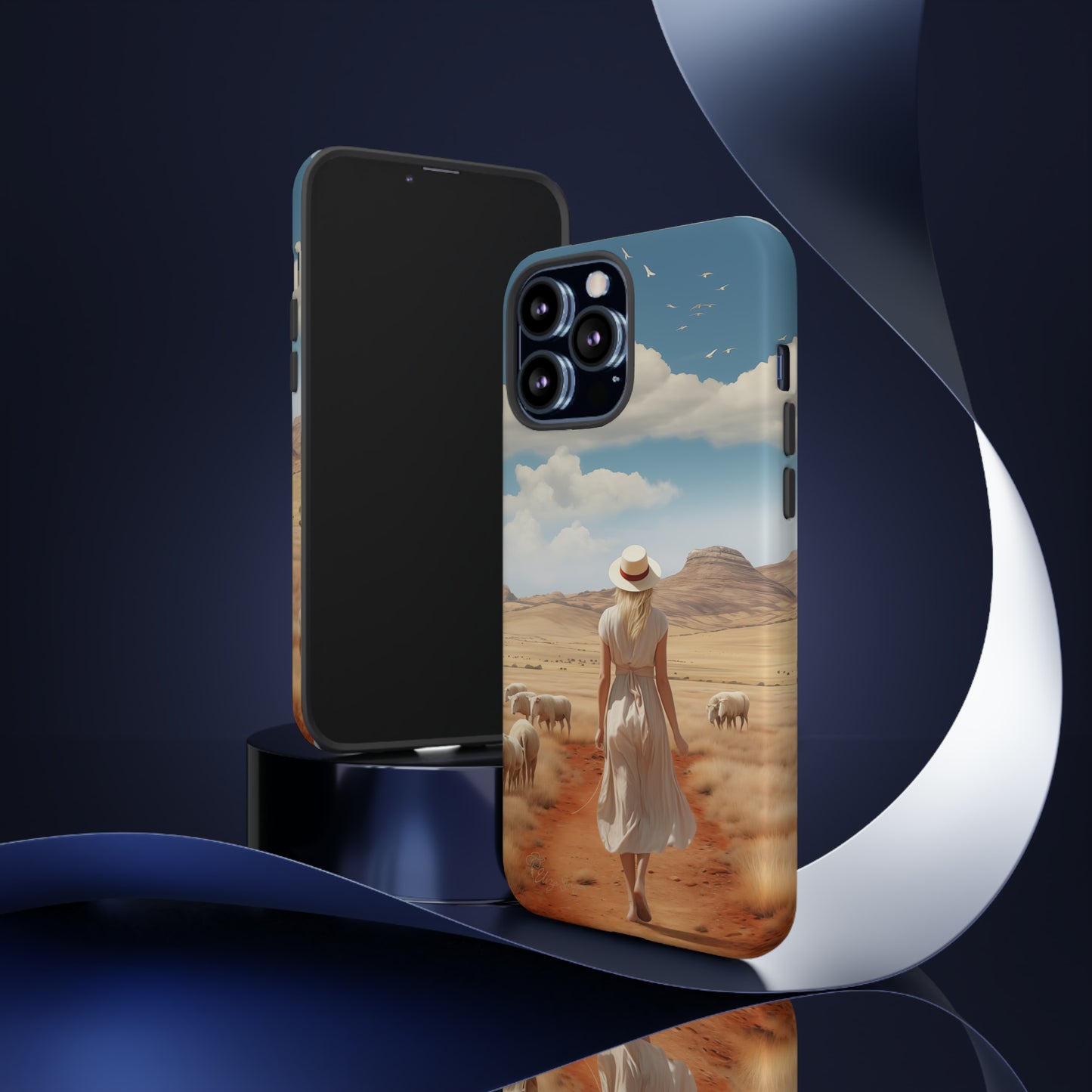 Serenity in Hand: Our Tough Western Cell Phone Case invites you to experience tranquility. A vintage painted design portrays a woman in a skirt and hat walking on a dirt road through a prairie, with grazing sheep. Let the vanishing horizon captivate your senses. Elevate your phone with timeless beauty. #ElizaSinger #PhoneCase