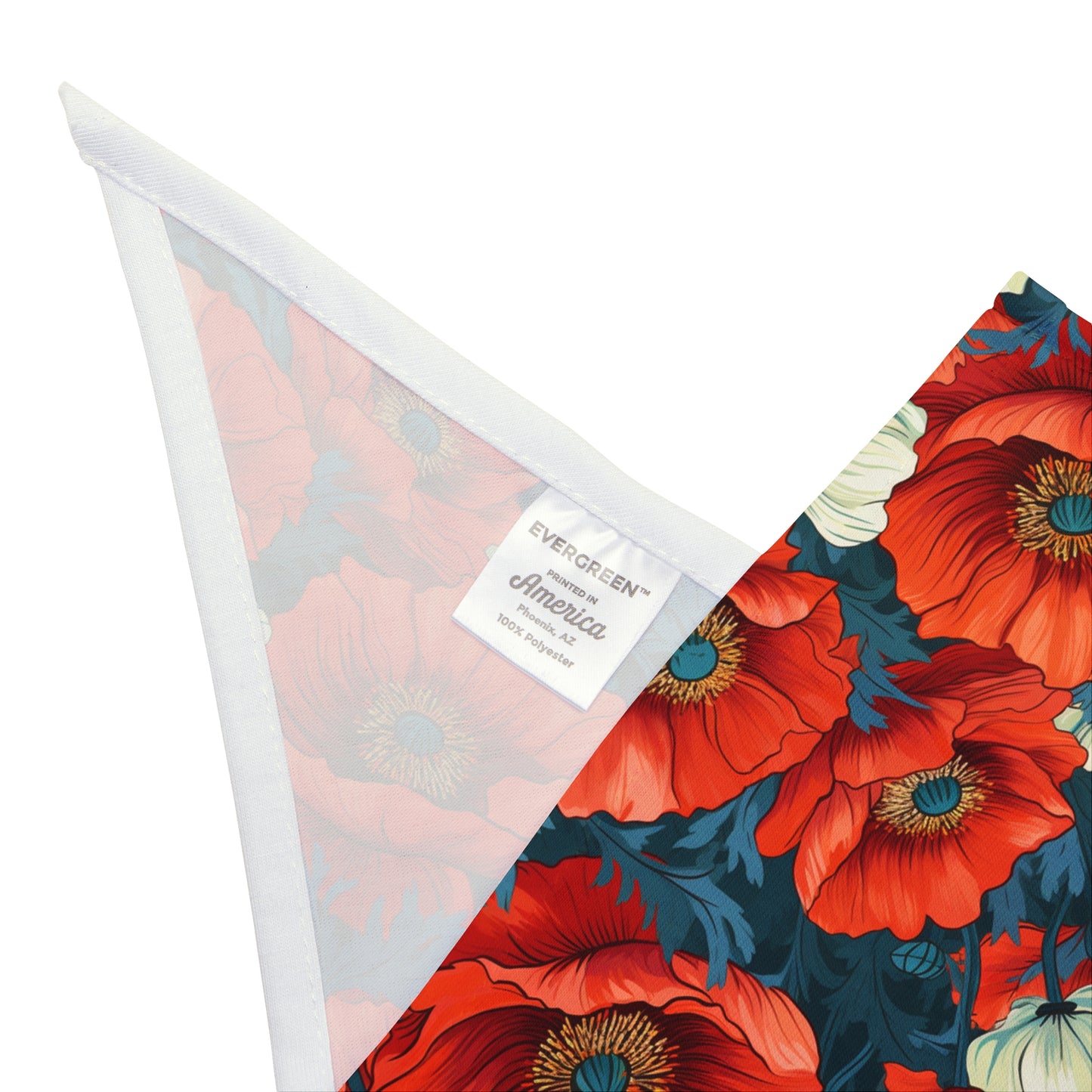 "Step into a field of vibrant charm with our Poppy Fields Dog Bandana/Wild Rag. Red poppies with touches of white on a vibrant blue background create a lively and eye-catching look. Crafted from soft-spun polyester, this bandana/wild rag ensures both comfort and durability. Explore exclusive pet fashion at Eliza Singer, where each piece is a celebration of nature's vibrant beauty, designed for the discerning pet enthusiast.