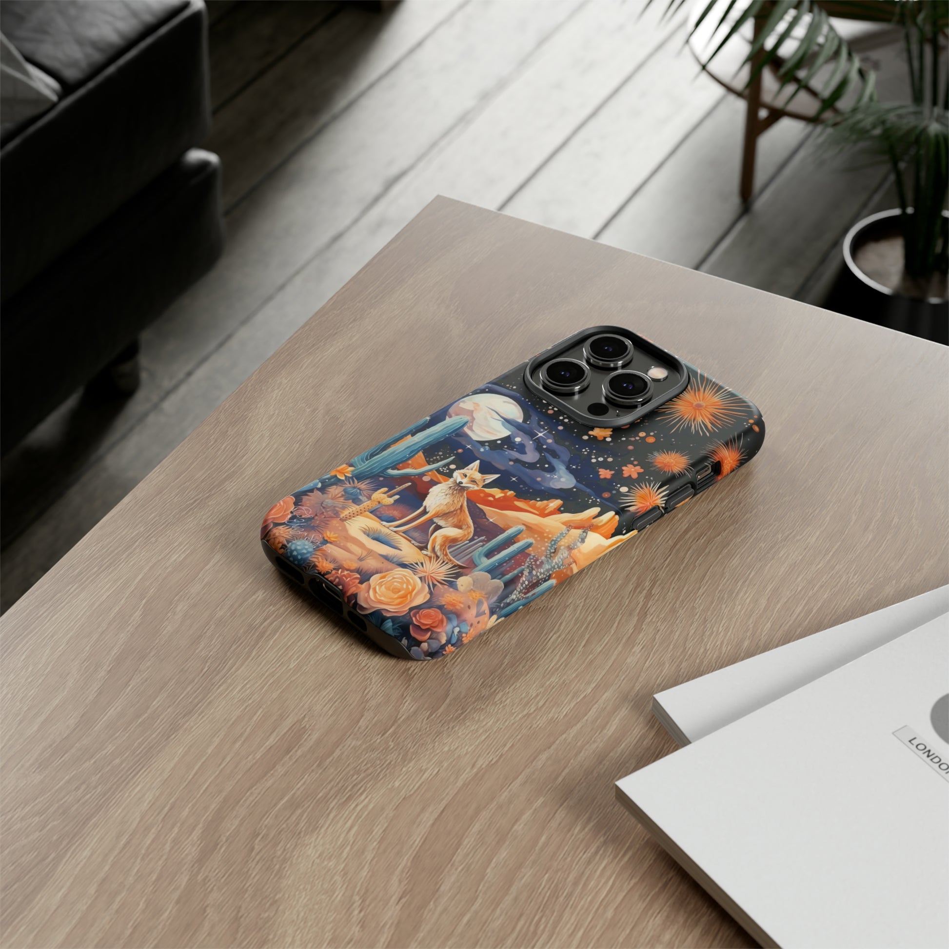 Introducing our Tough Western Cell Phone Case: Midnight Mirage Jackal Edition! Dive into the mysterious desert night with a striking depiction of a jackal, cacti, and a starry sky. This design offers the ideal combination of durability and desert charm.
