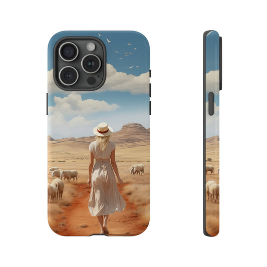 Serenity in Hand: Our Tough Western Cell Phone Case invites you to experience tranquility. A vintage painted design portrays a woman in a skirt and hat walking on a dirt road through a prairie, with grazing sheep. Let the vanishing horizon captivate your senses. Elevate your phone with timeless beauty. #ElizaSinger #PhoneCase 