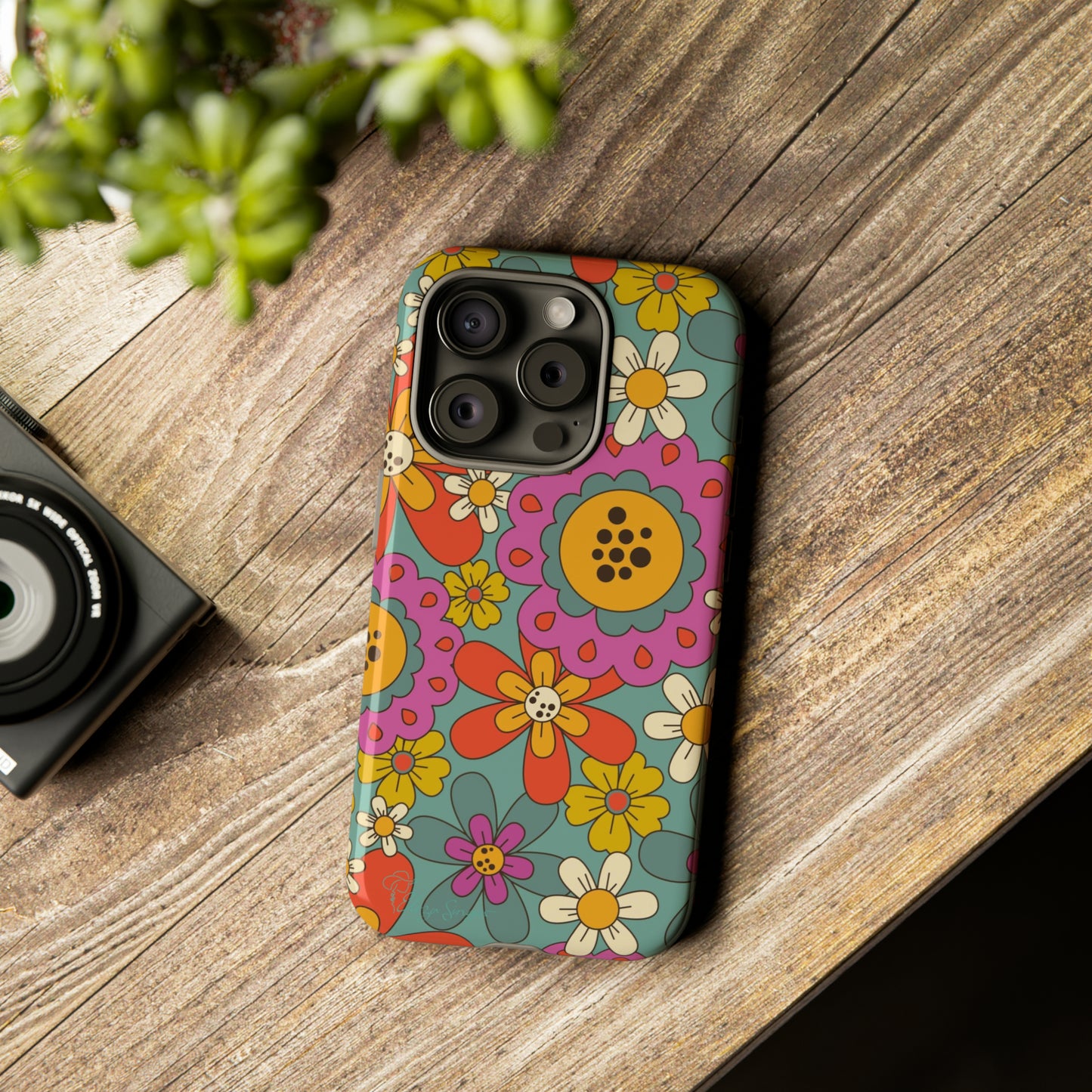 Step into the Groove: Groovy Hippie Hippy Design iPhone Tough Protective Cover. A nod to the 60's with Daisy Design in Turquoise and Pink. Compatible with iPhone 15, 14, 13, XS, XR Pro/Max/Mini/P/Plus. Embrace Retro Vibes with Style and Durability. #ElizaSinger #PhoneCase #GroovyDesign 