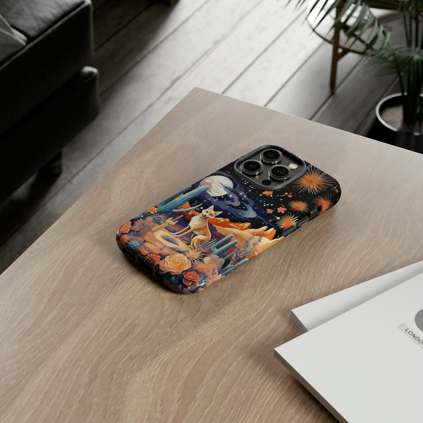 Introducing our Tough Western Cell Phone Case: Midnight Mirage Jackal Edition! Dive into the mysterious desert night with a striking depiction of a jackal, cacti, and a starry sky. This design offers the ideal combination of durability and desert charm.