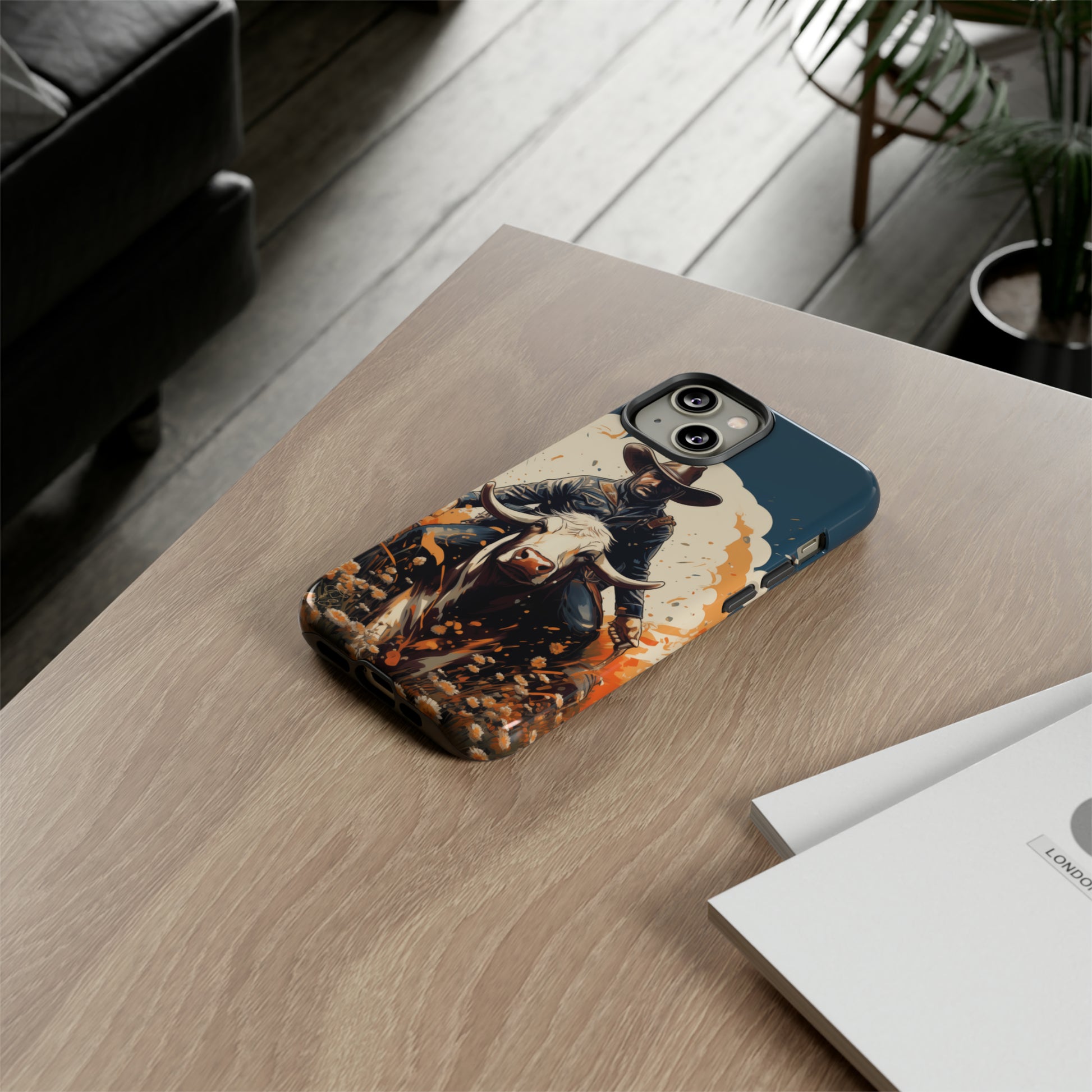 Time-Tested Charm: Immerse yourself in the charm of yesteryear with our Tough Cell Phone Case. Featuring a cowboy on a cow in a field of flowers, this design exudes retro vibes. Experience the perfect blend of vintage style and durable protection. Elevate your phone with a touch of timeless allure. #ElizaSinger #PhoneCase #VintageCharm