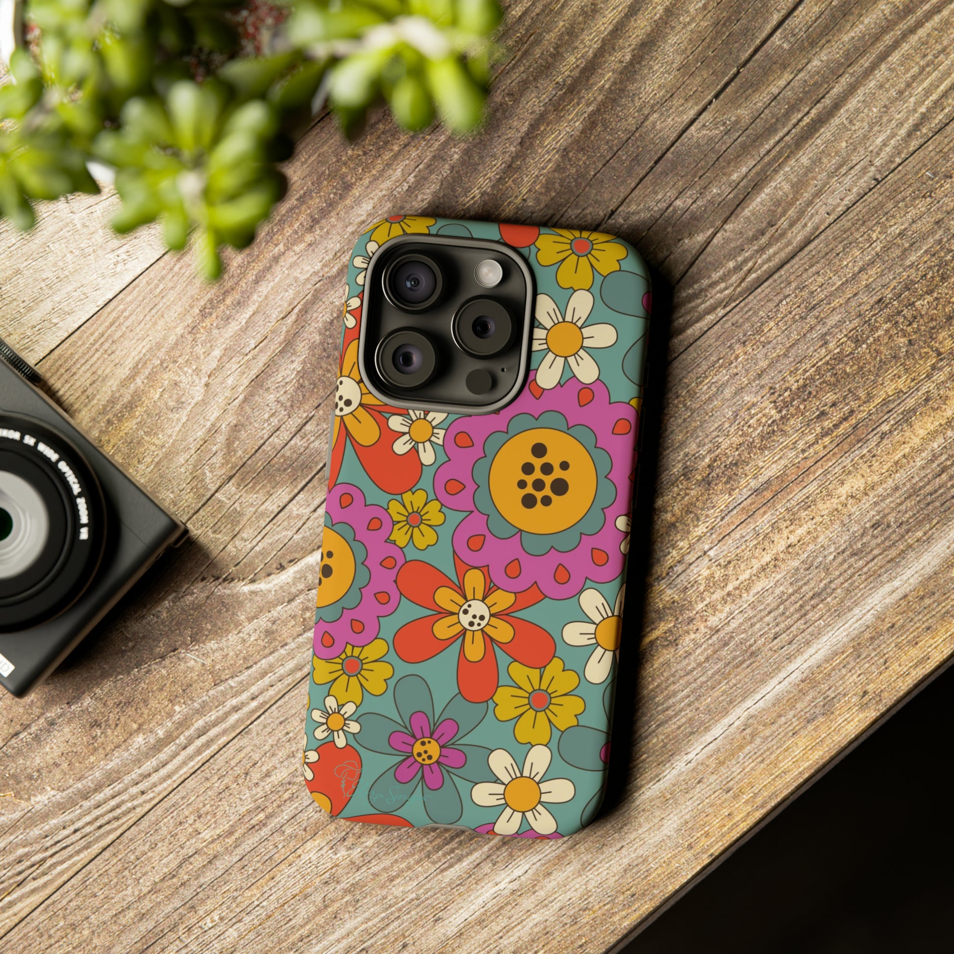 Step into the Groove: Groovy Hippie Hippy Design iPhone Tough Protective Cover. A nod to the 60's with Daisy Design in Turquoise and Pink. Compatible with iPhone 15, 14, 13, XS, XR Pro/Max/Mini/P/Plus. Embrace Retro Vibes with Style and Durability. #ElizaSinger #PhoneCase #GroovyDesign 